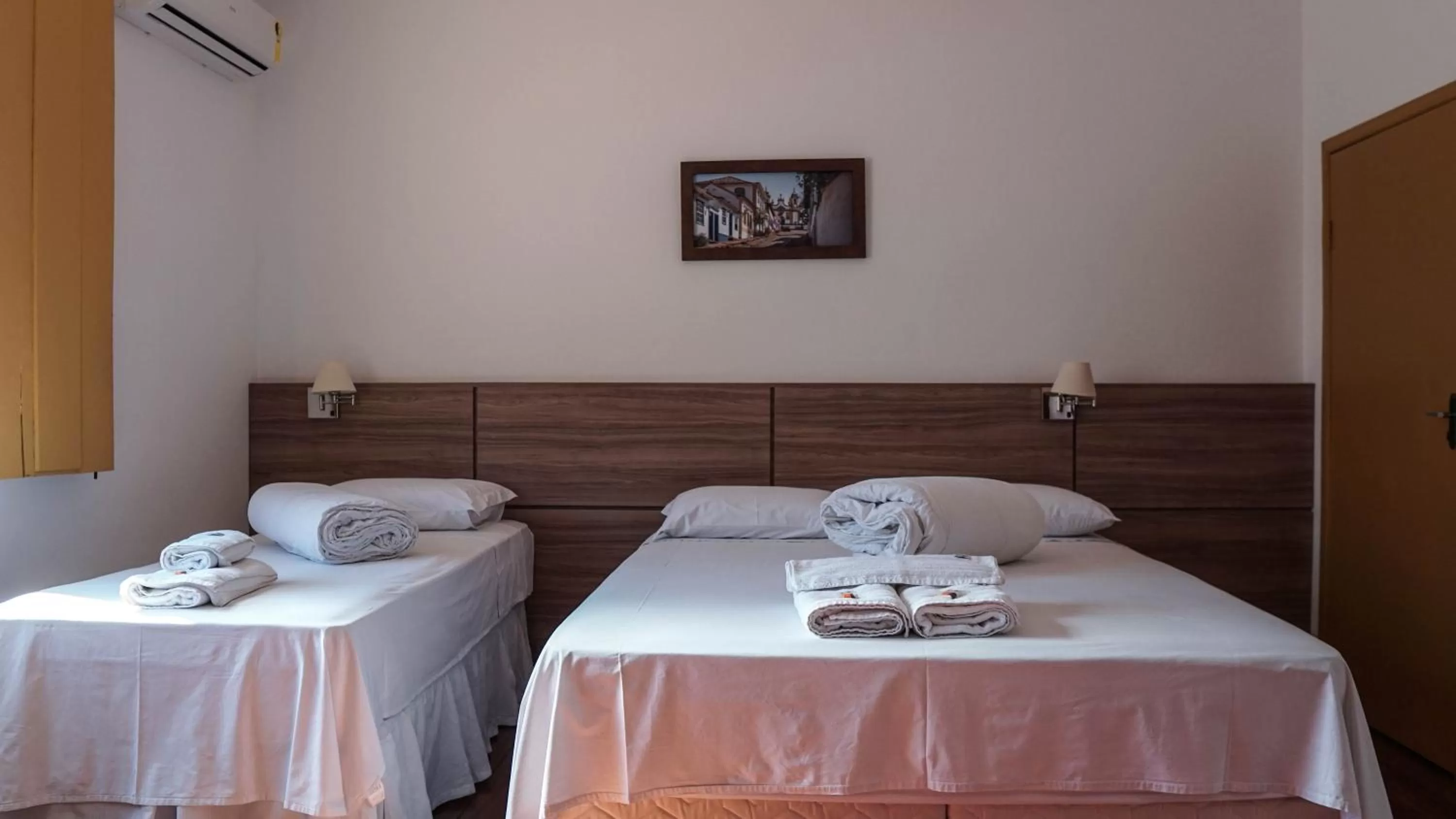 Bed in Pousada o Amanhecer