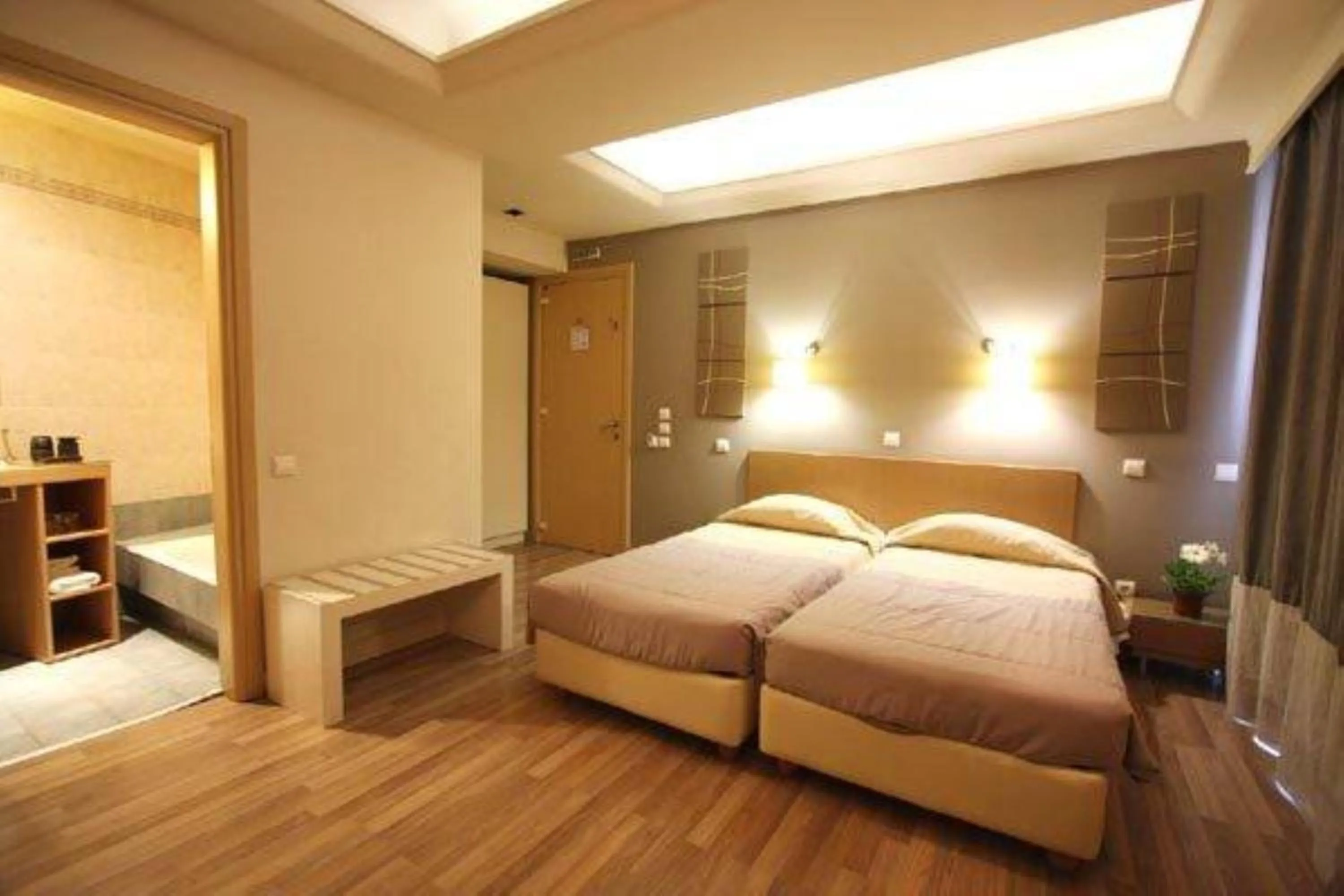 Bed in Ariston Hotel