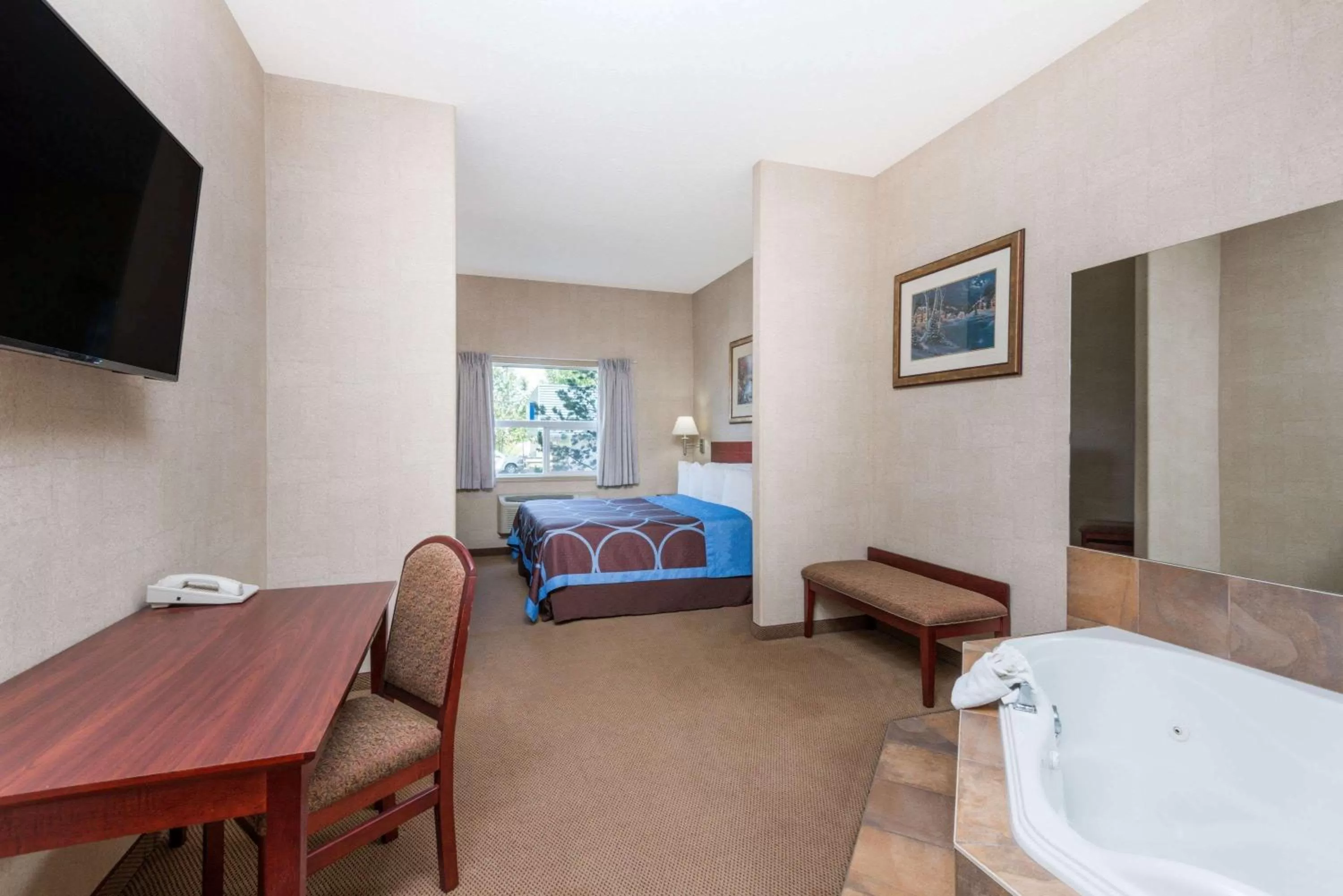 Photo of the whole room, Seating Area in Super 8 by Wyndham Red Deer City Centre