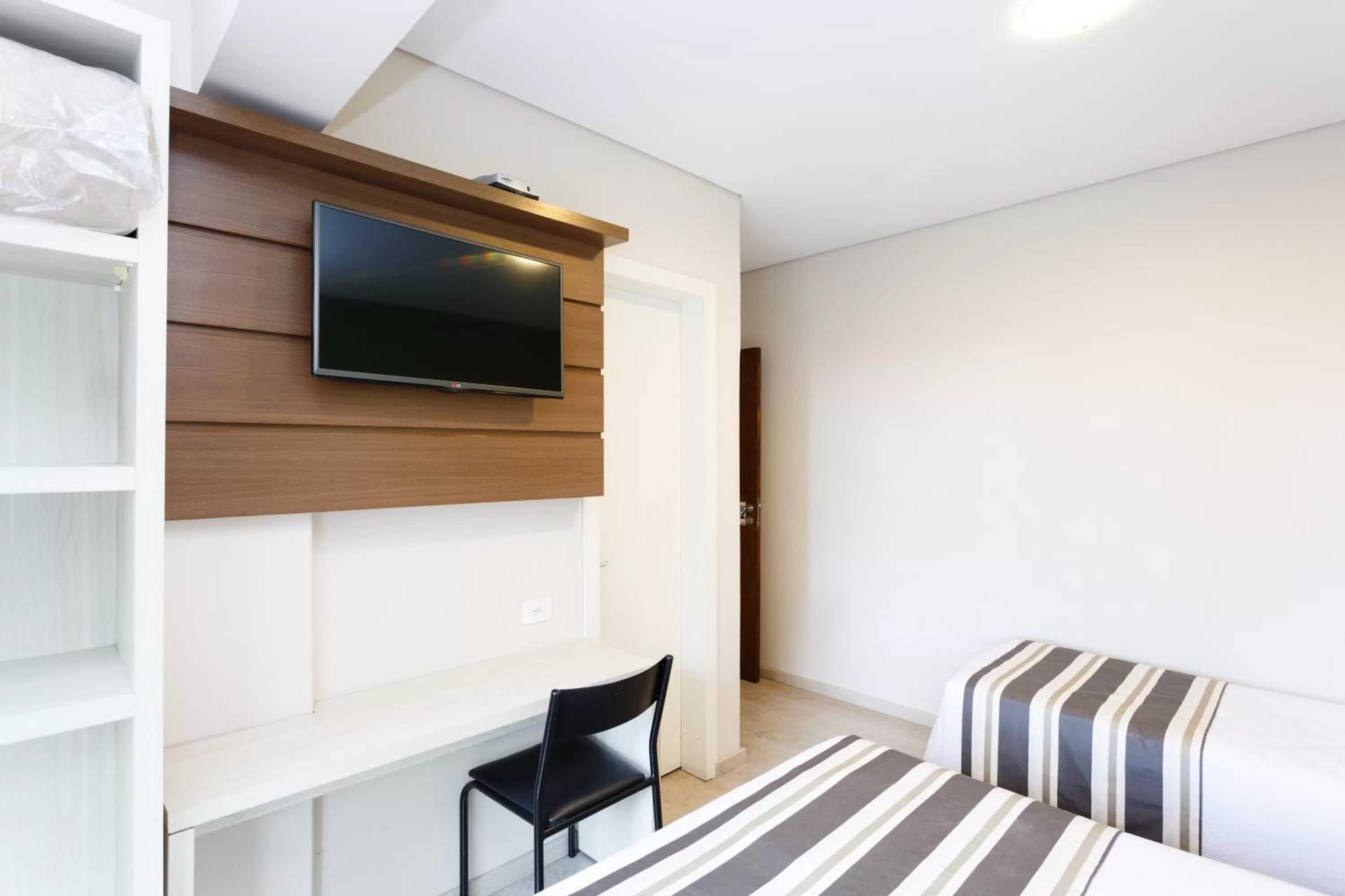 TV/Entertainment Center in Hotel Sol By MRHotelaria