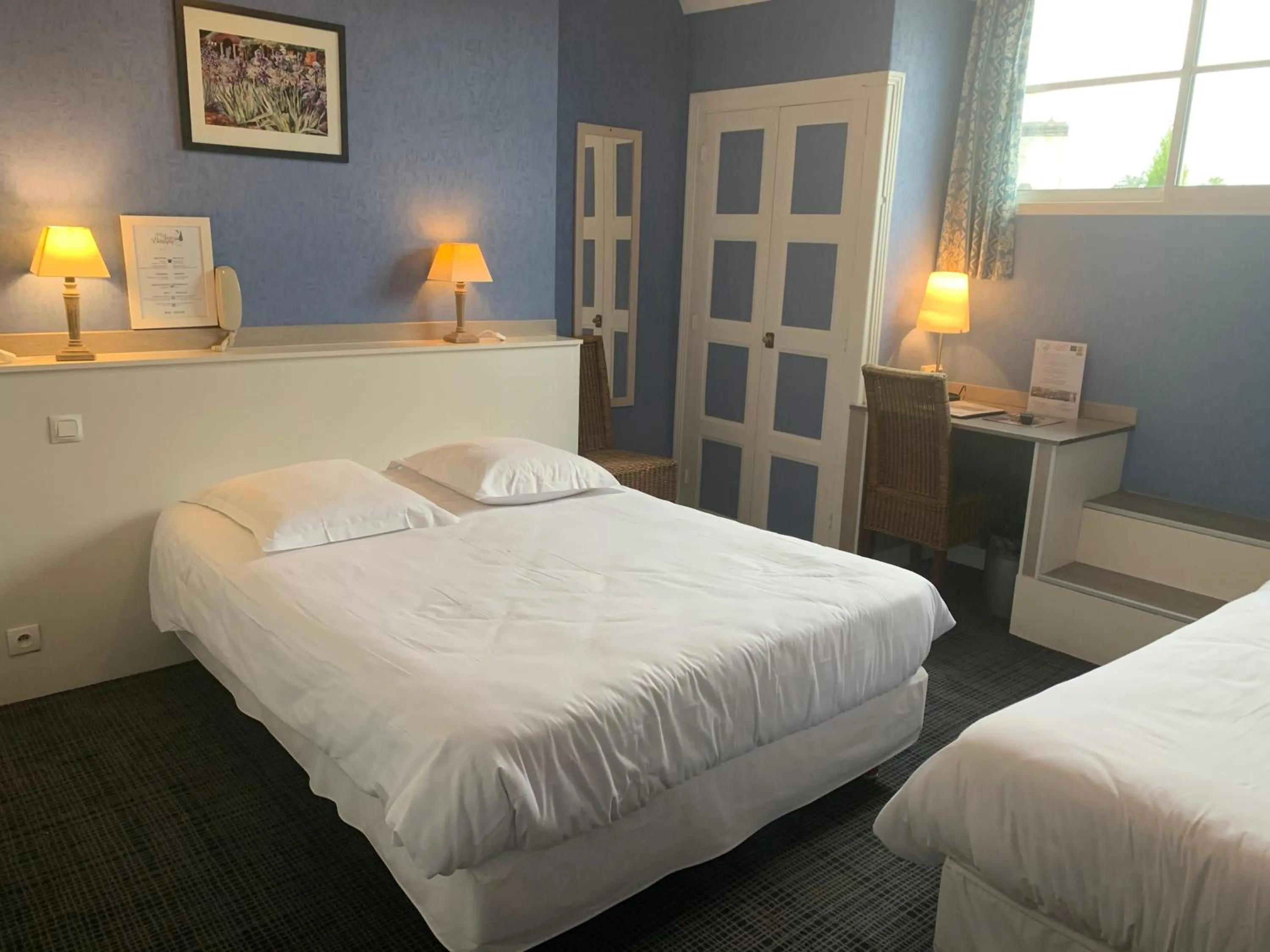 Photo of the whole room, Bed in Hotel Anne De Bretagne BLOIS