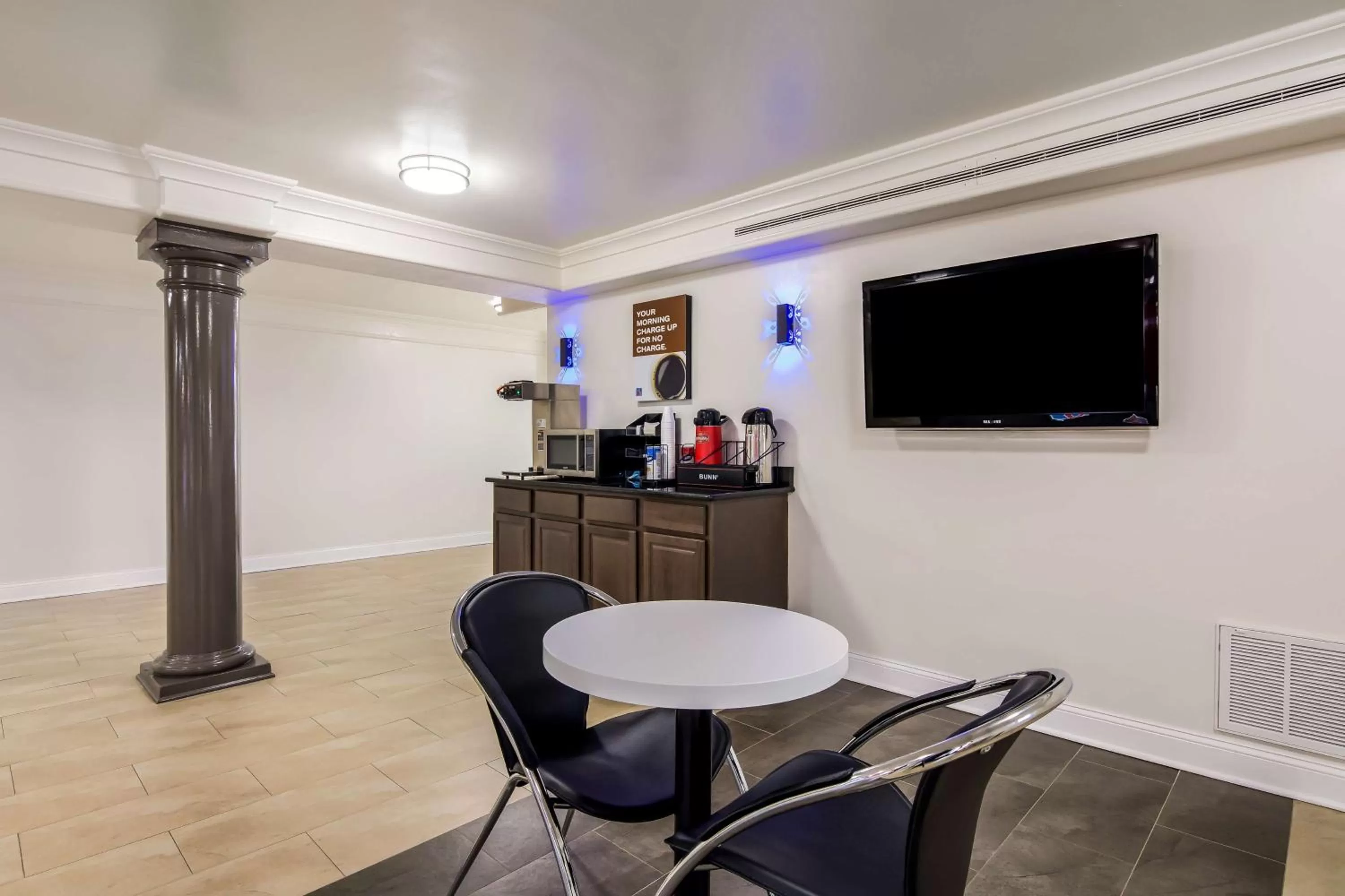 Communal lounge/ TV room in Motel 6-North Little Rock, AR - McCain