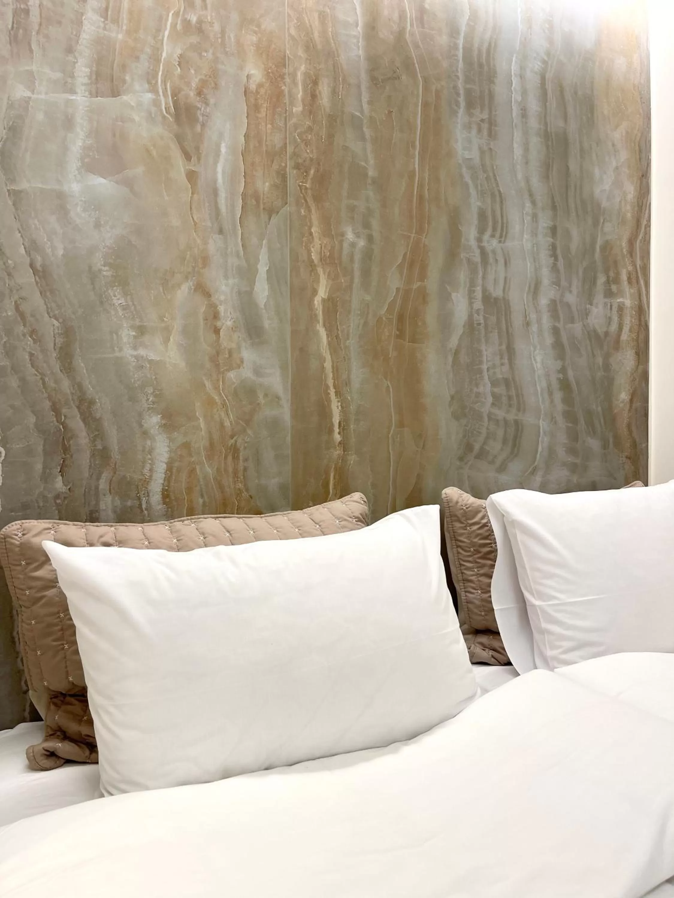 Bed in Aesthesis Arxontiko Luxury Rooms