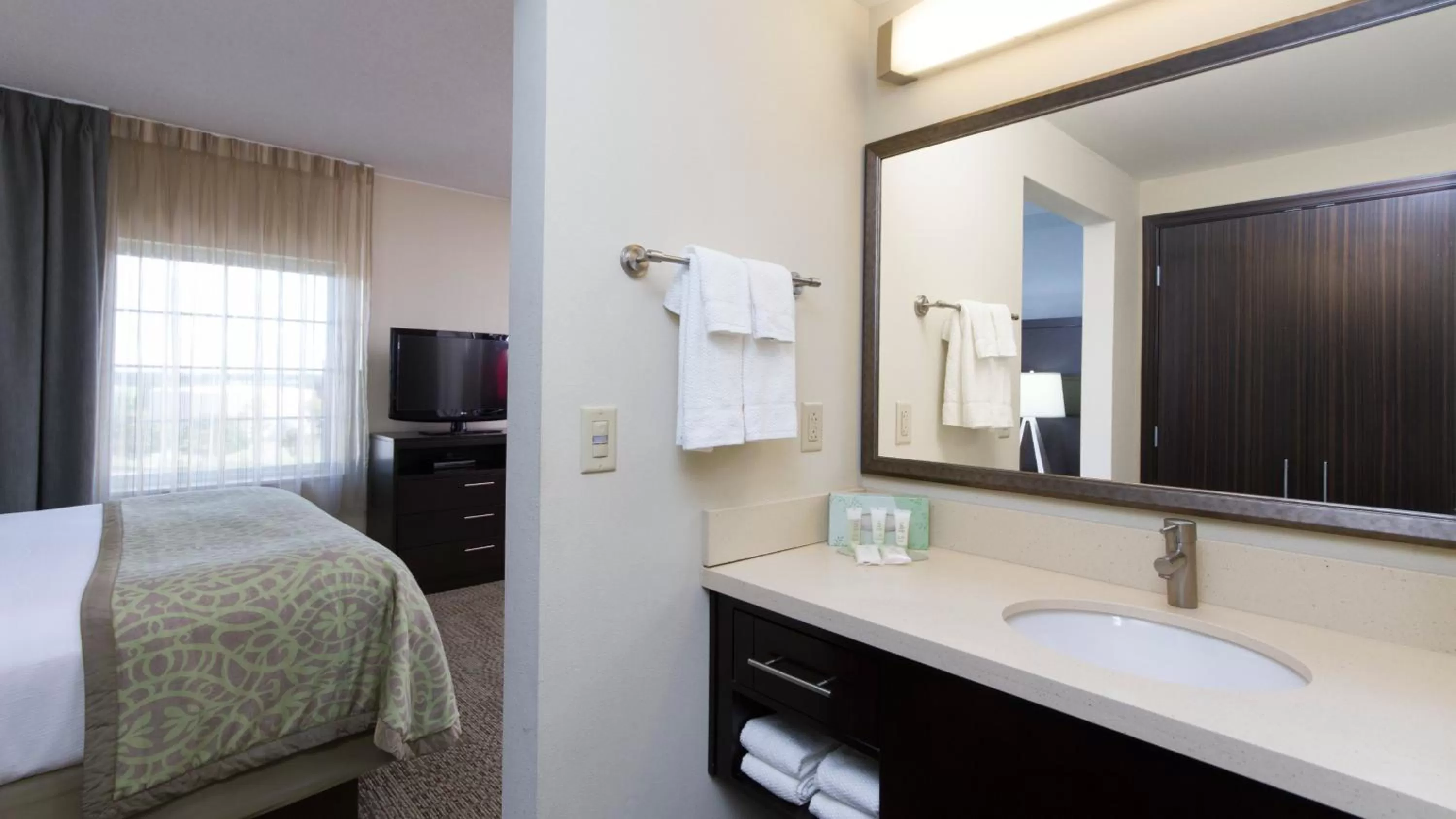 Bathroom, Bed in Staybridge Suites Buffalo-Amherst by IHG