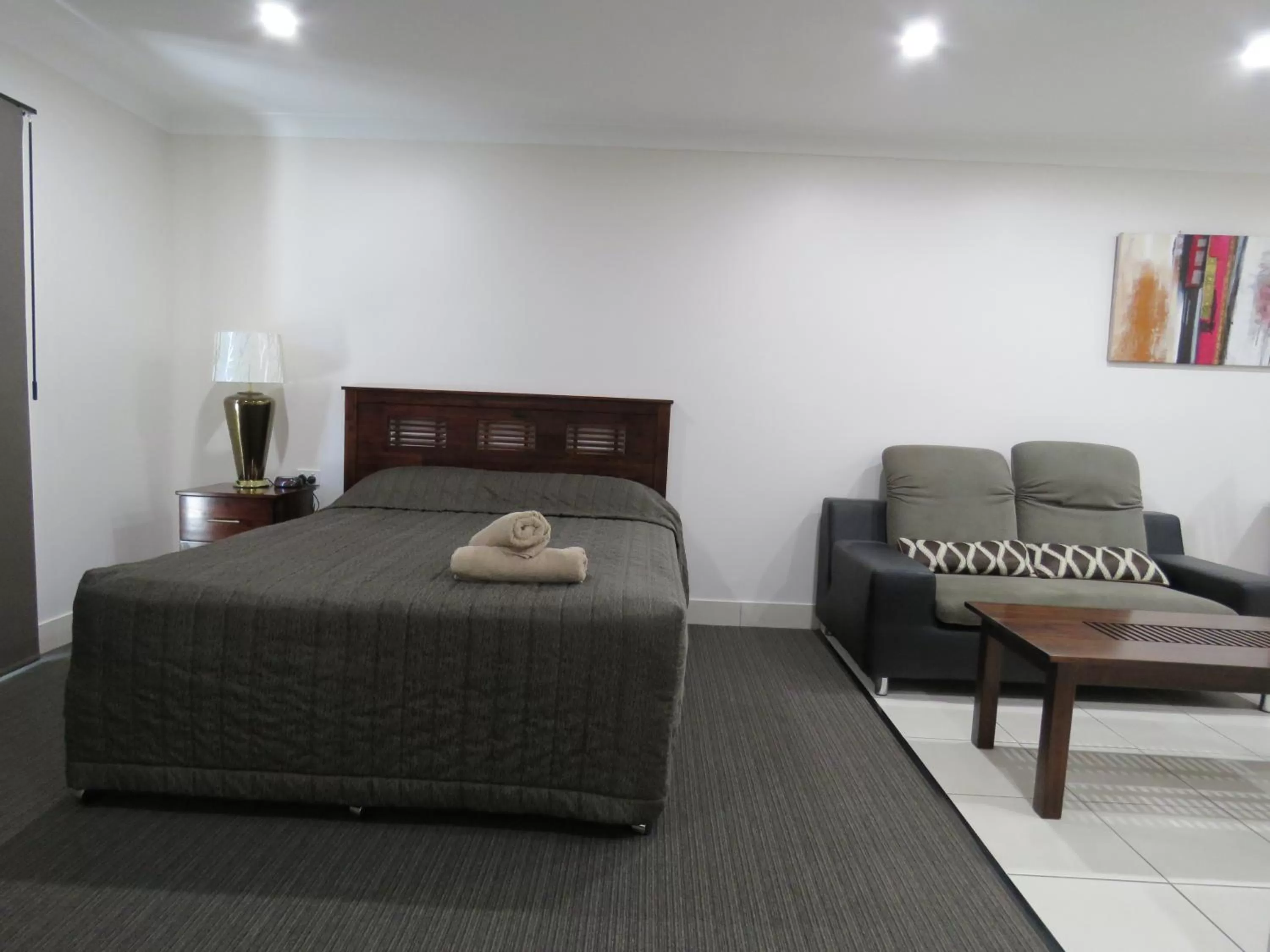 Bed in Emerald Gardens Motel & Apartments