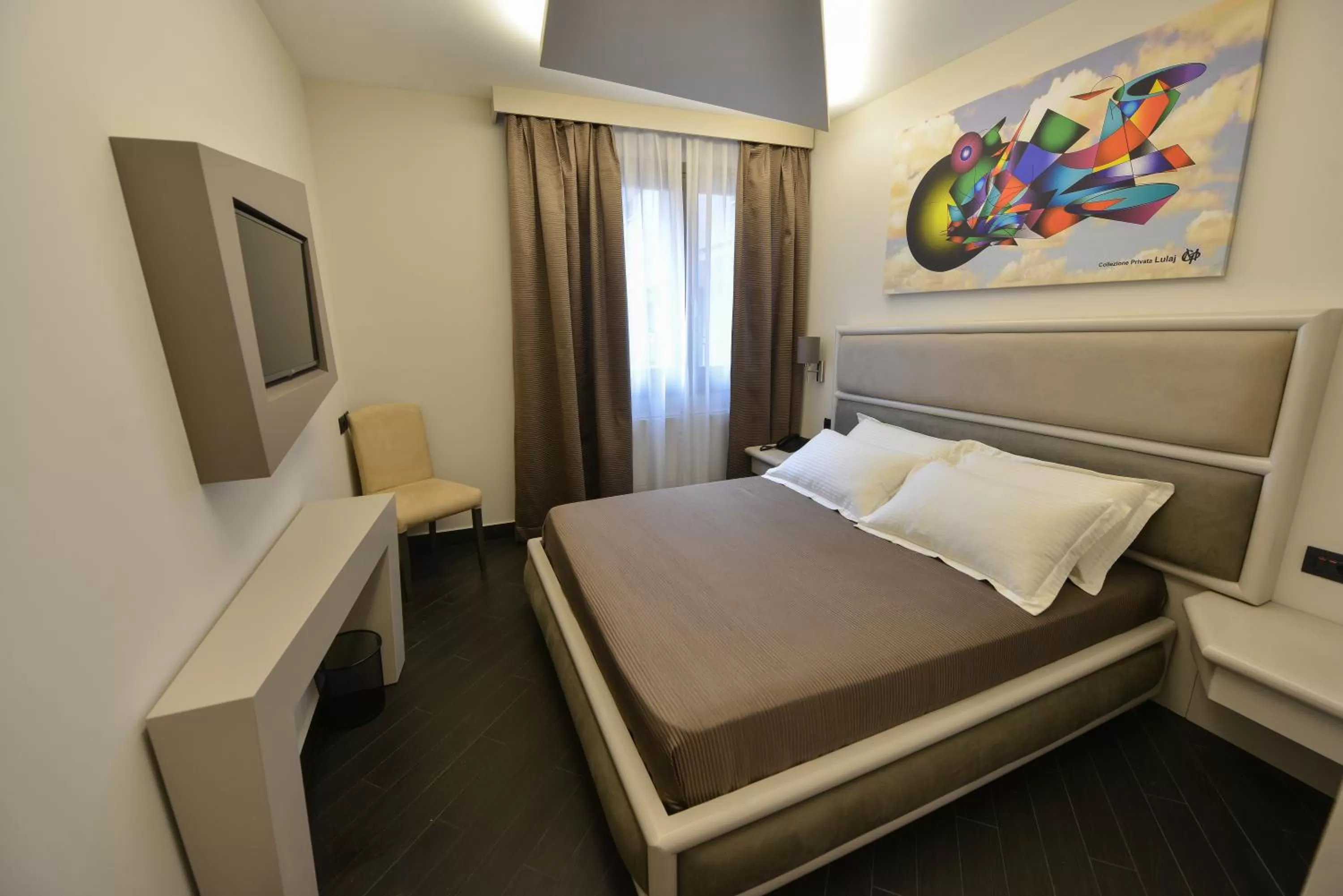 Bed in Petit Hotel Elita