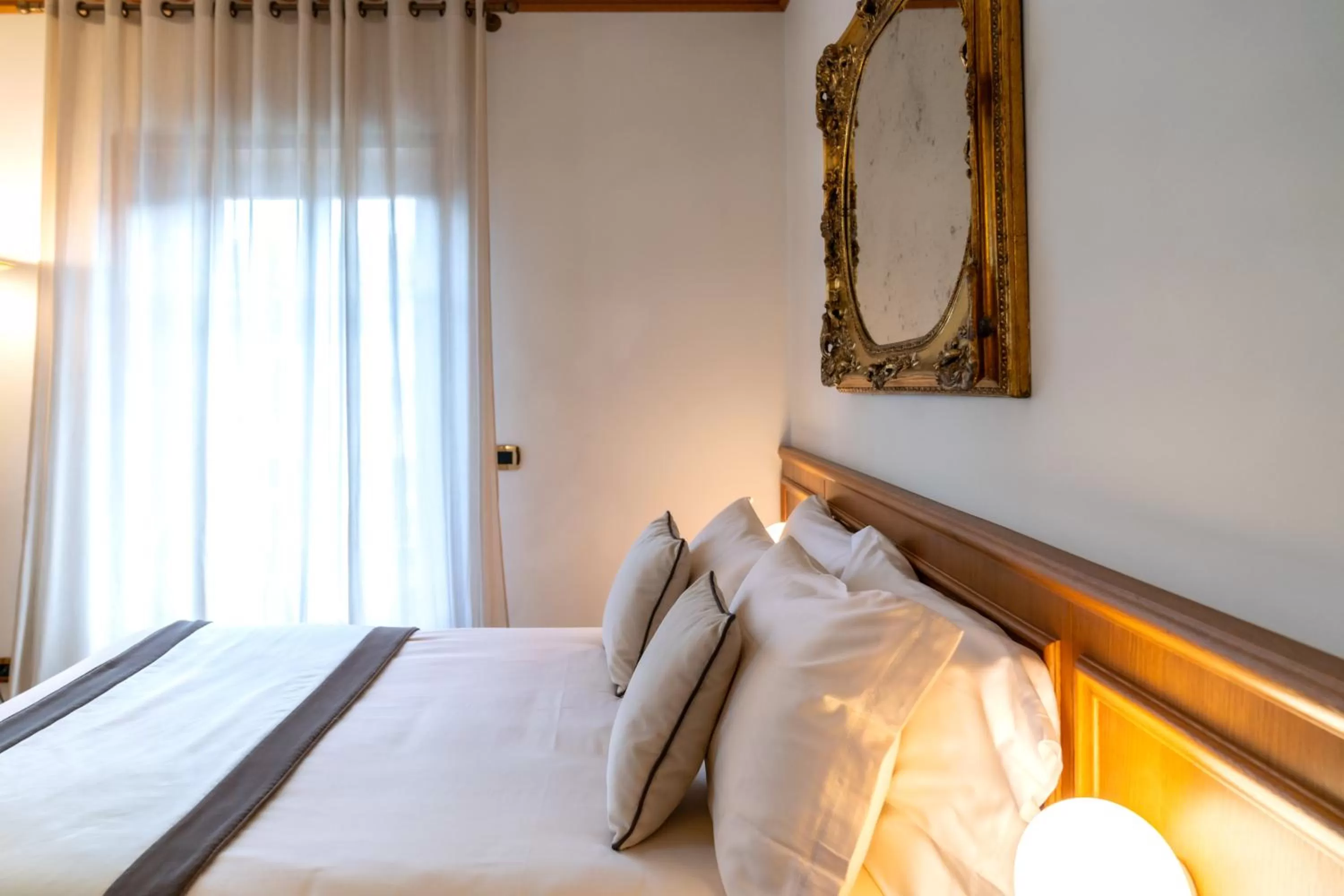 Bed in Ambra Cortina Luxury&Fashion Hotel