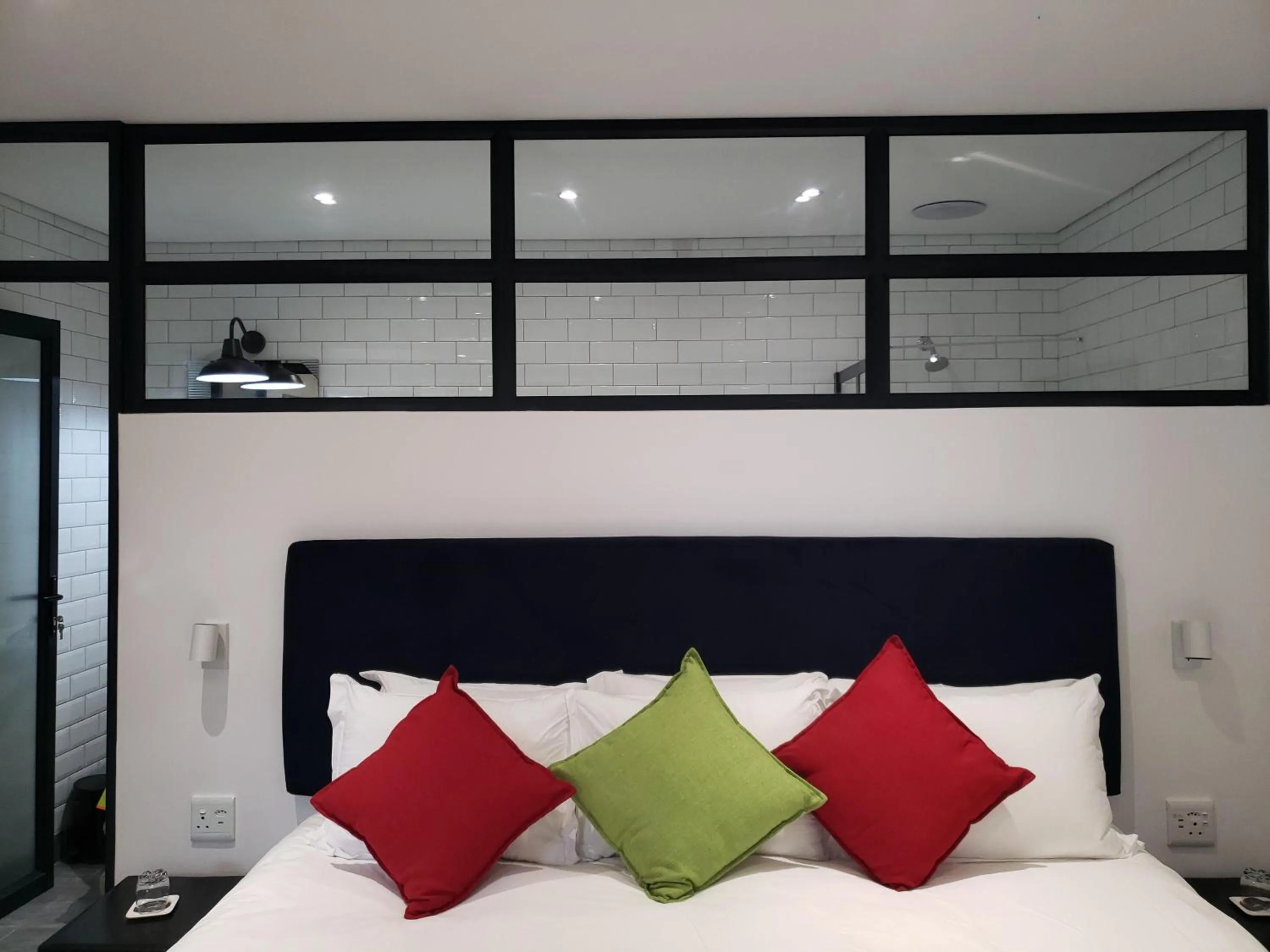 Bed in Point B Guest House -Sustainable Solar Energy