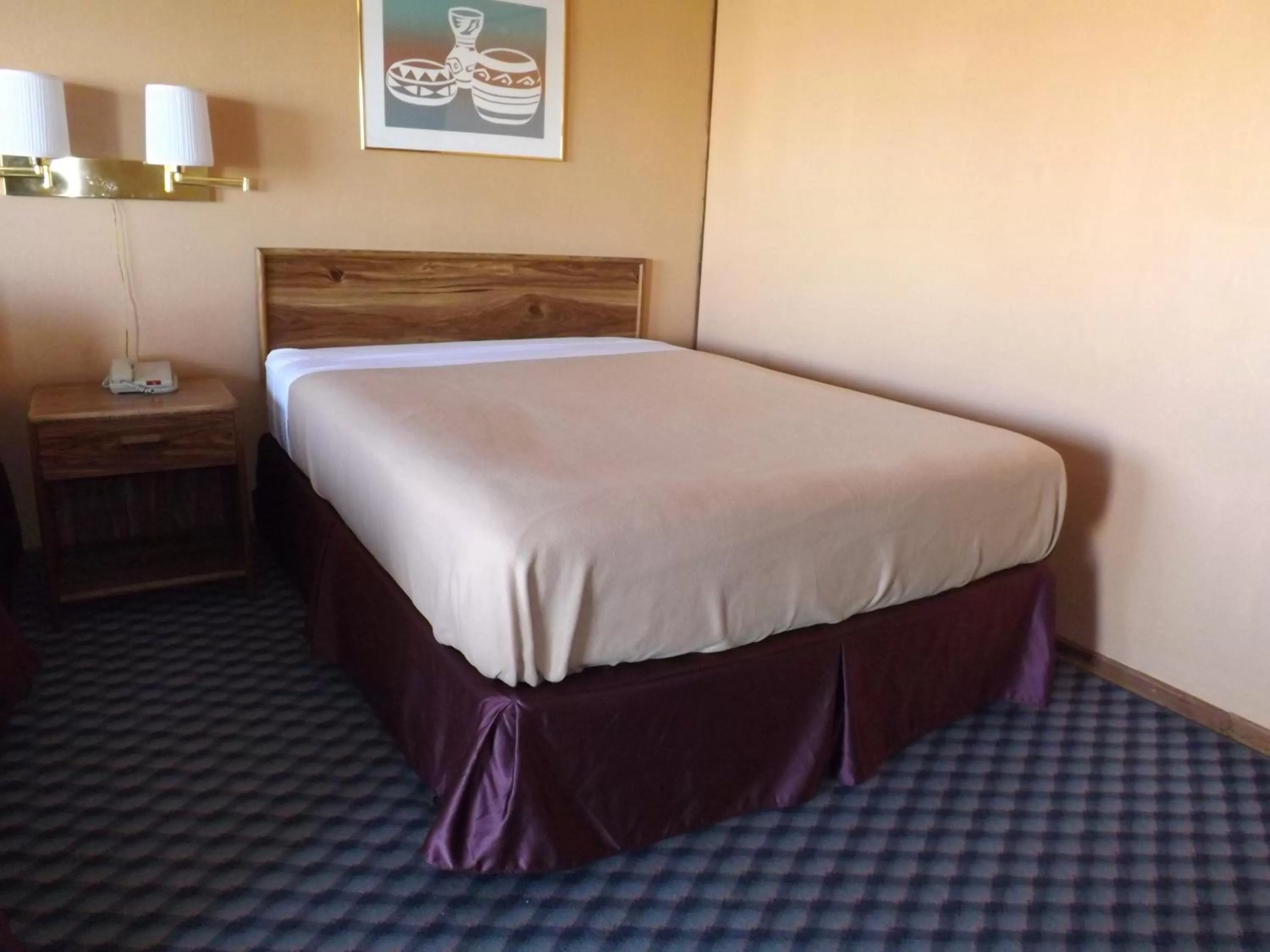 Bed in Tristar Inn Xpress