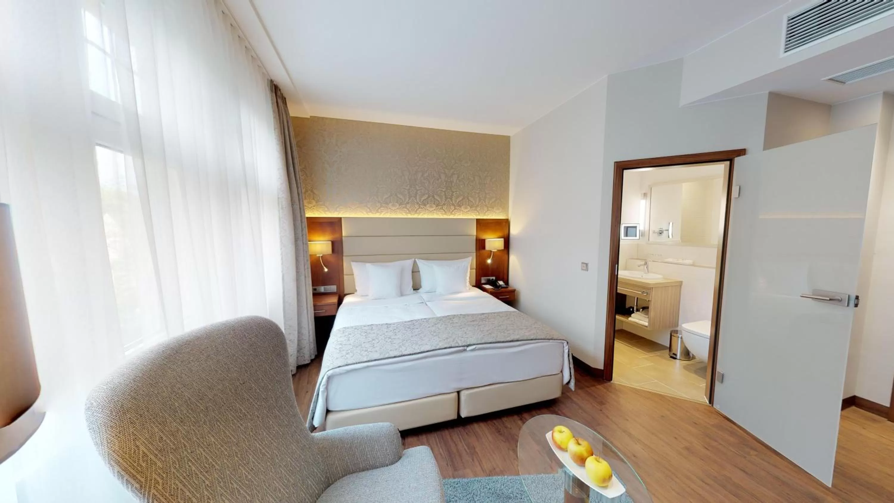 Photo of the whole room, Bed in Hotel Oranien Wiesbaden