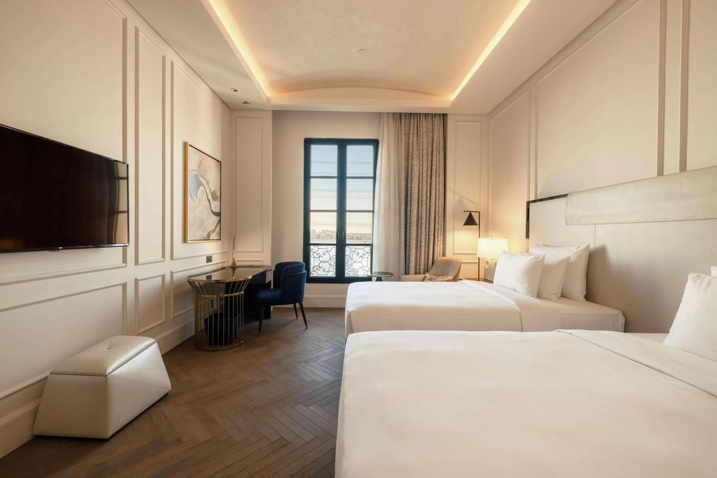 Photo of the whole room, Bed in Mansard Riyadh, a Radisson Collection Hotel