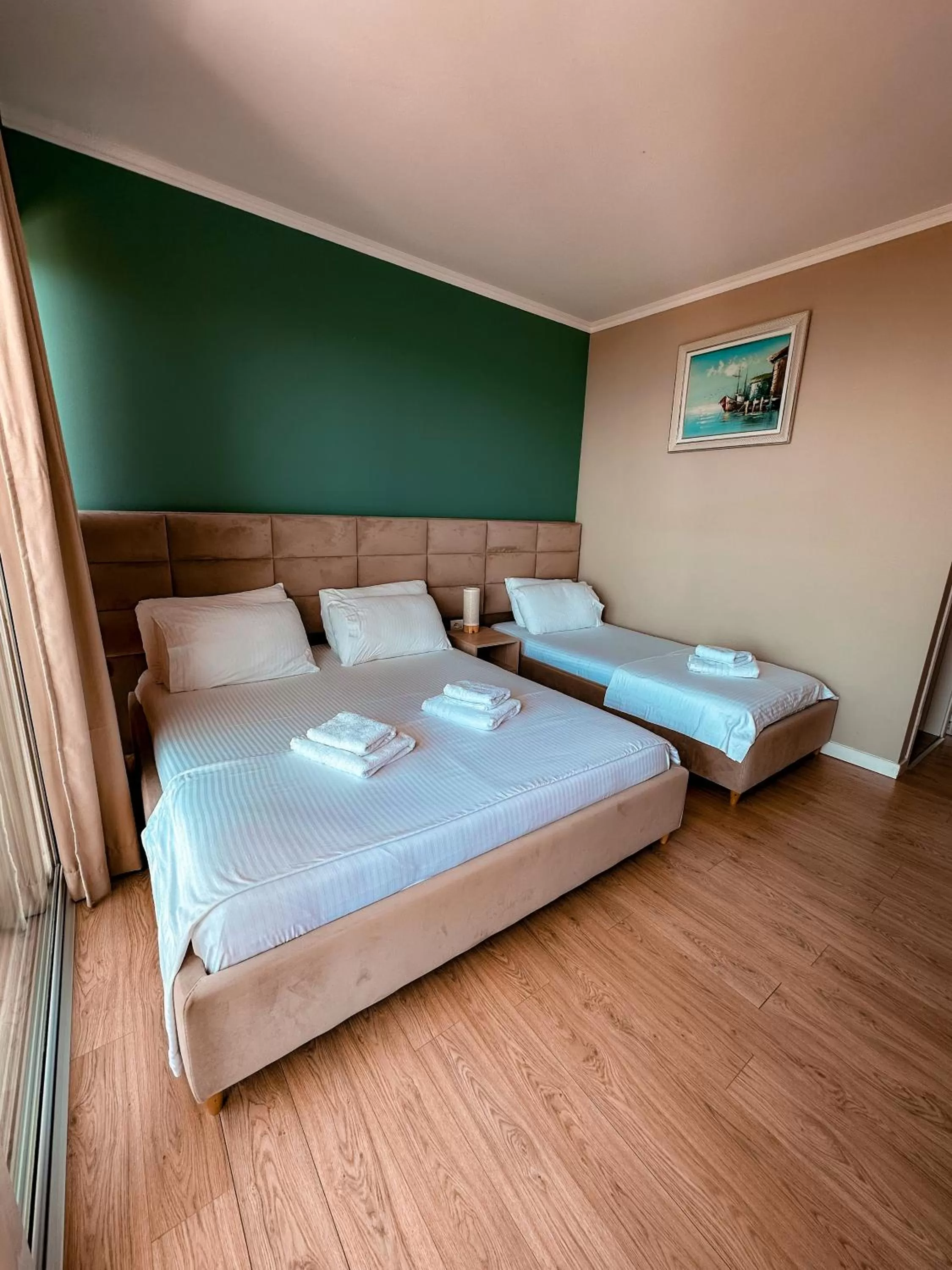 Bed in Aphrodite Garden Rooms & Apartment