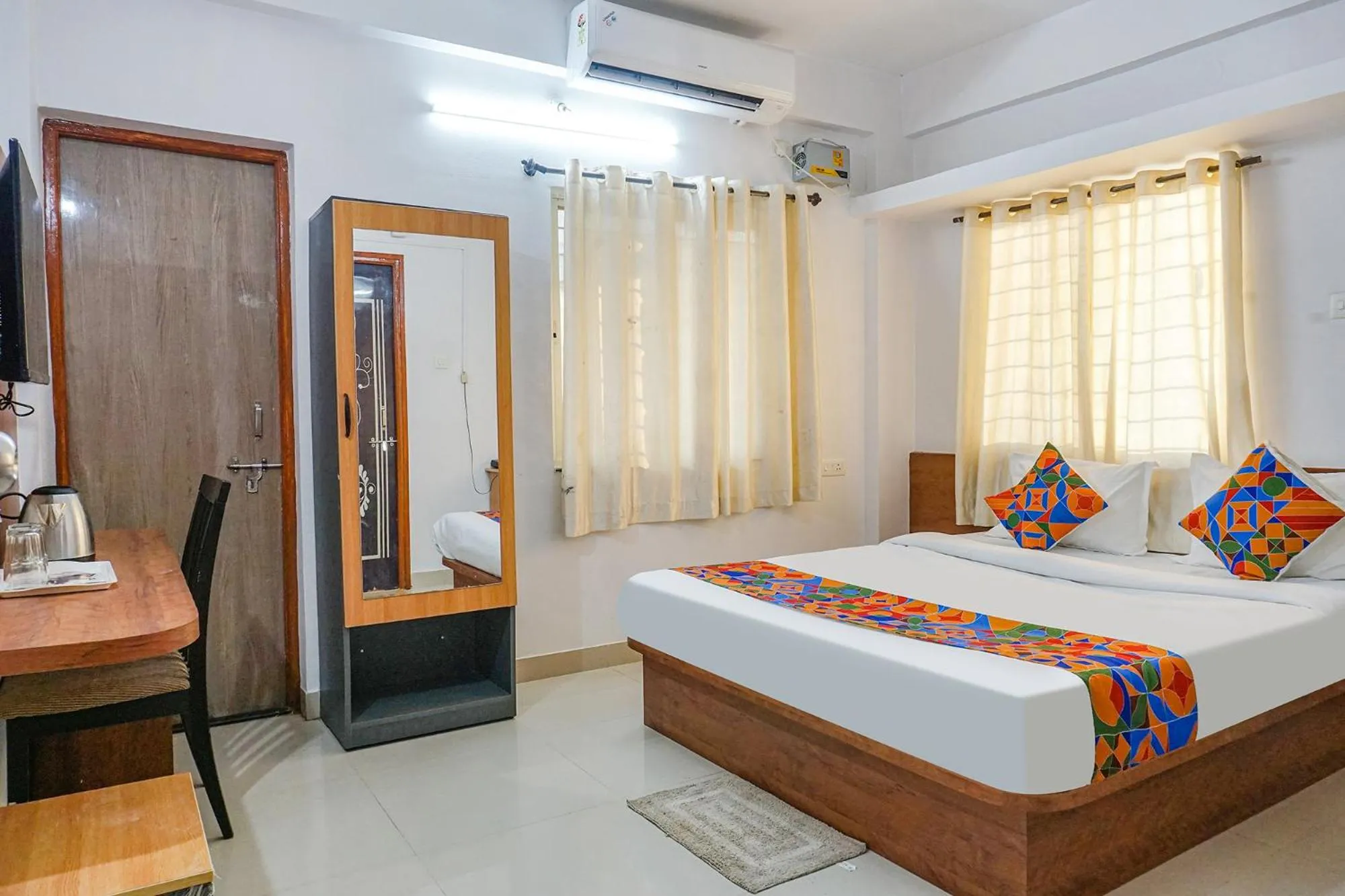 Bed in FabHotel Lake View - Chinmaya Vitthal Mandir