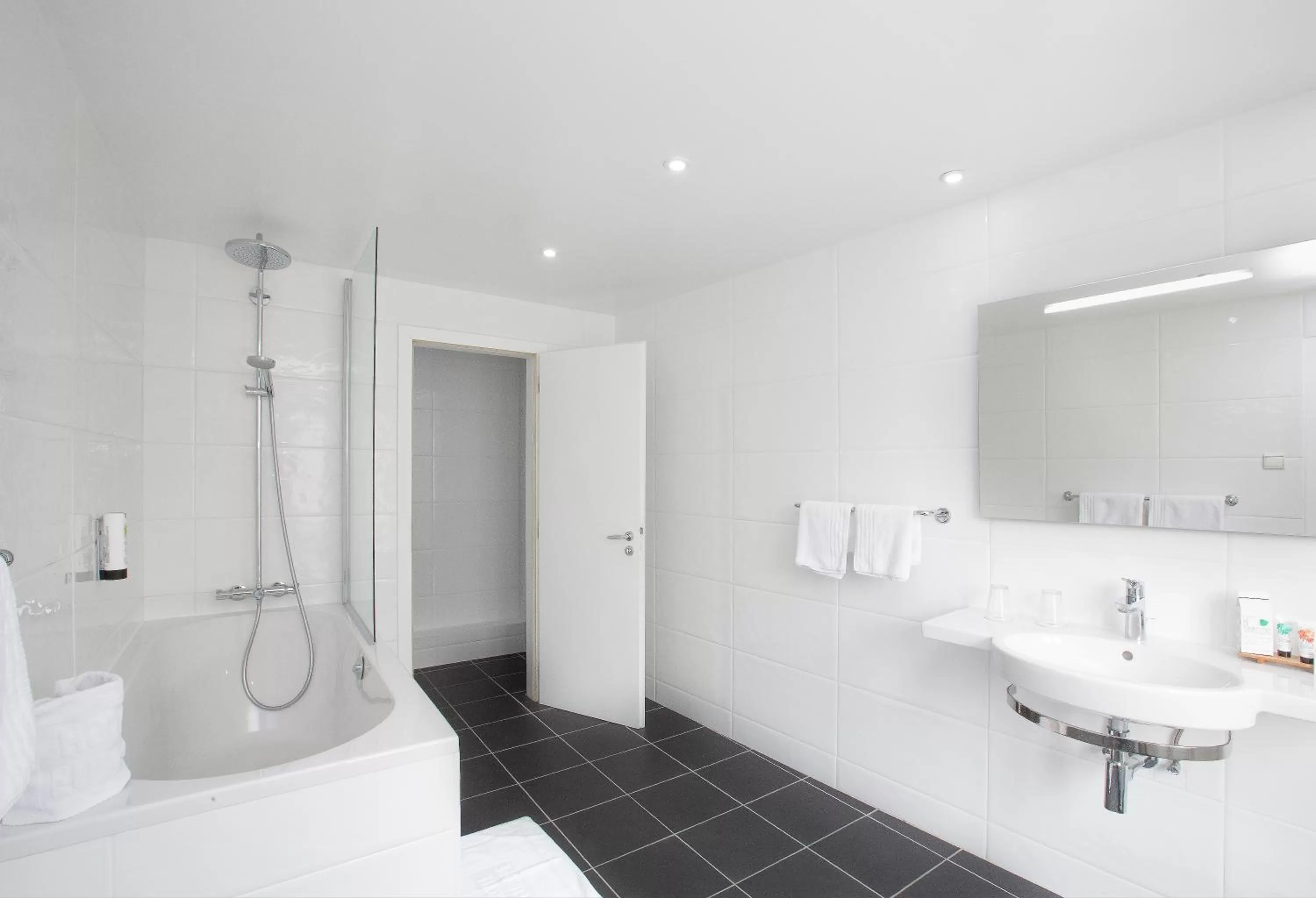 Bathroom in Hôtel de l'Europe by HappyCulture