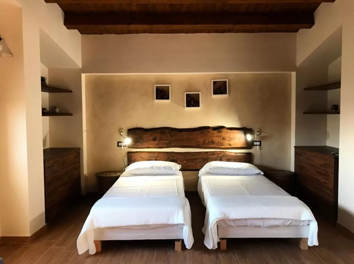 Bed in LA PERGOLA - Affitta Camere