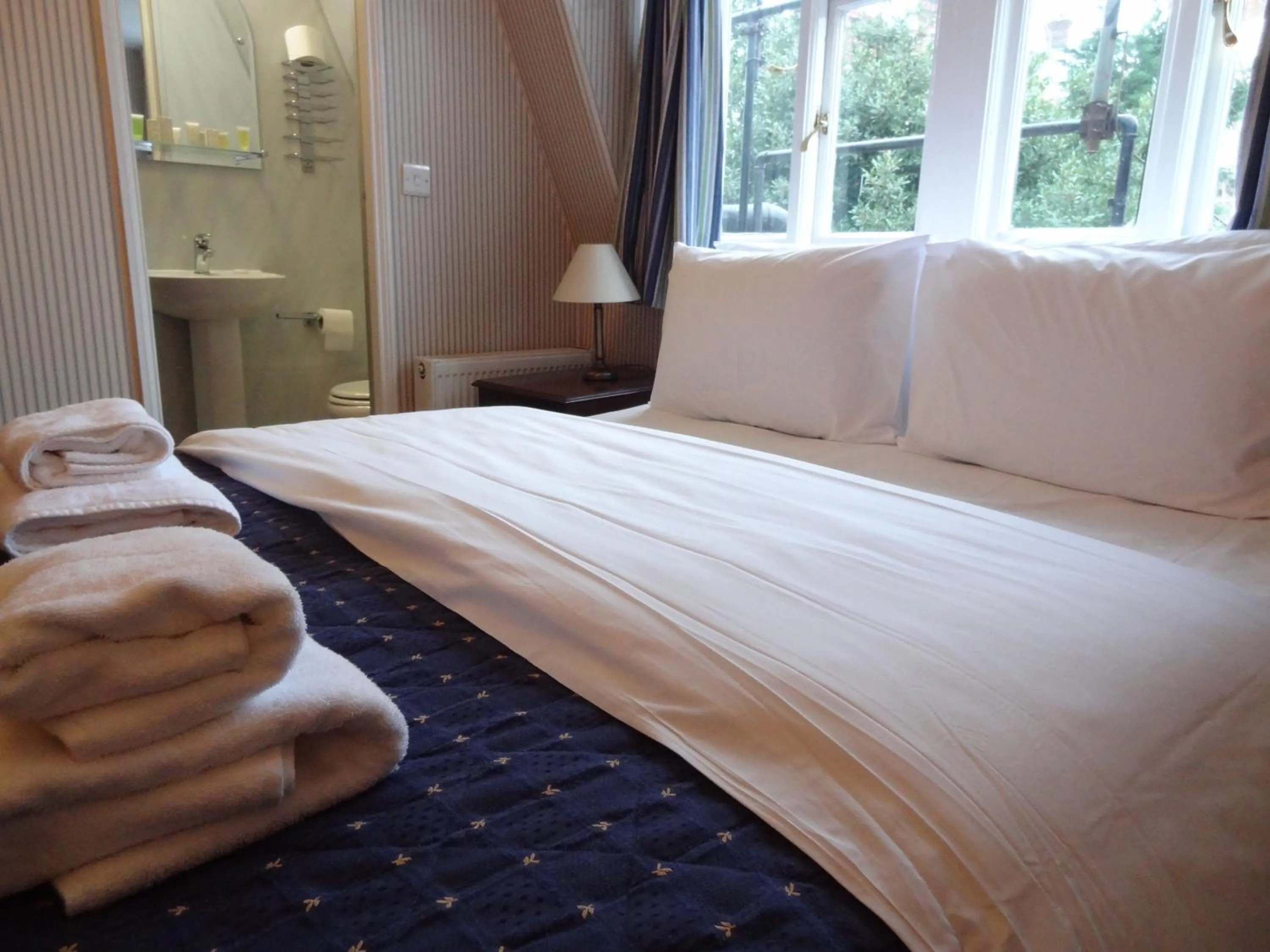 Bed in Regency House Hotel
