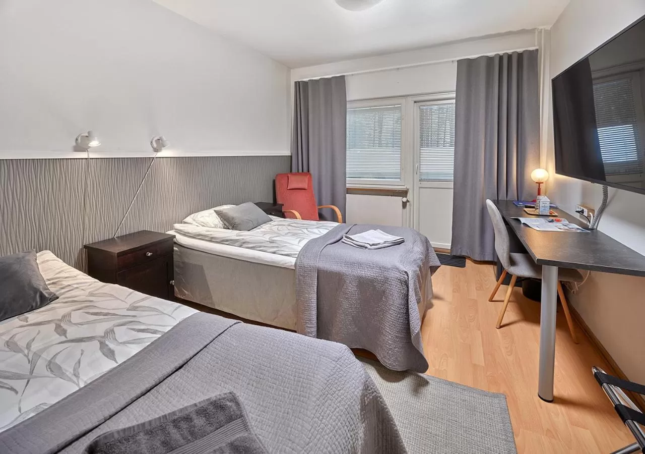 Photo of the whole room, Bed in Hotelli-Ravintola Gasthaus Lohja