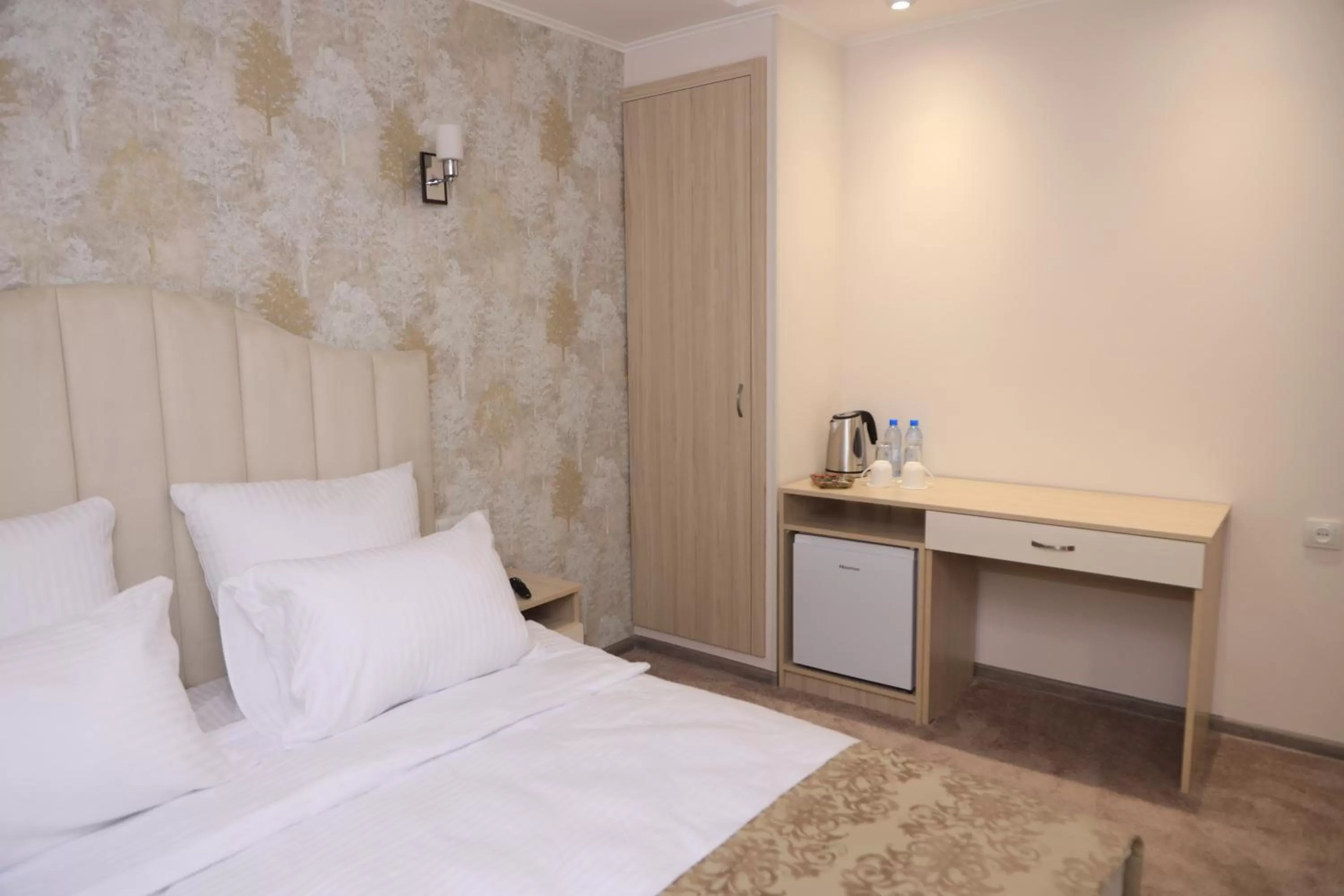 Bed in DeLin Hotel And Tours