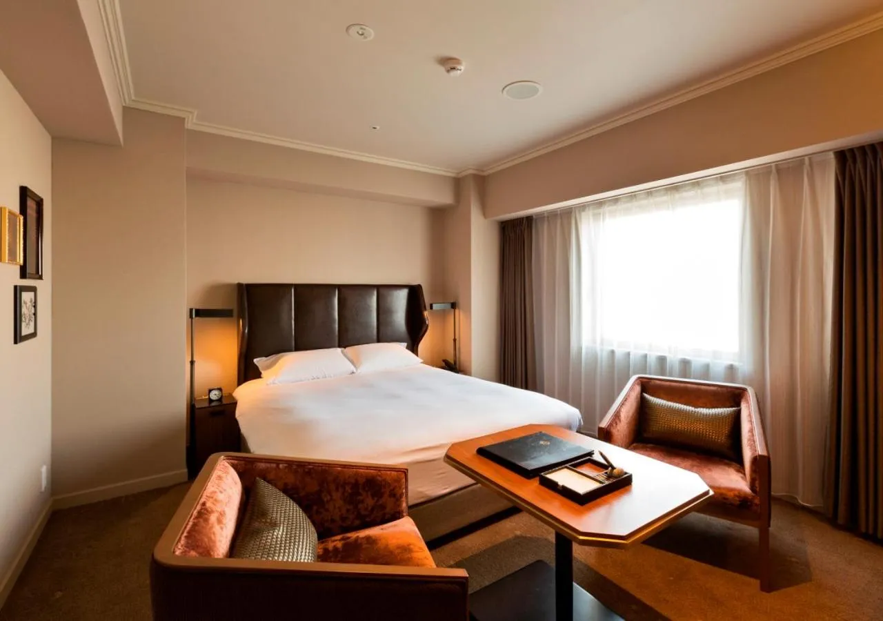 Bed in Royal Park Hotel Takamatsu