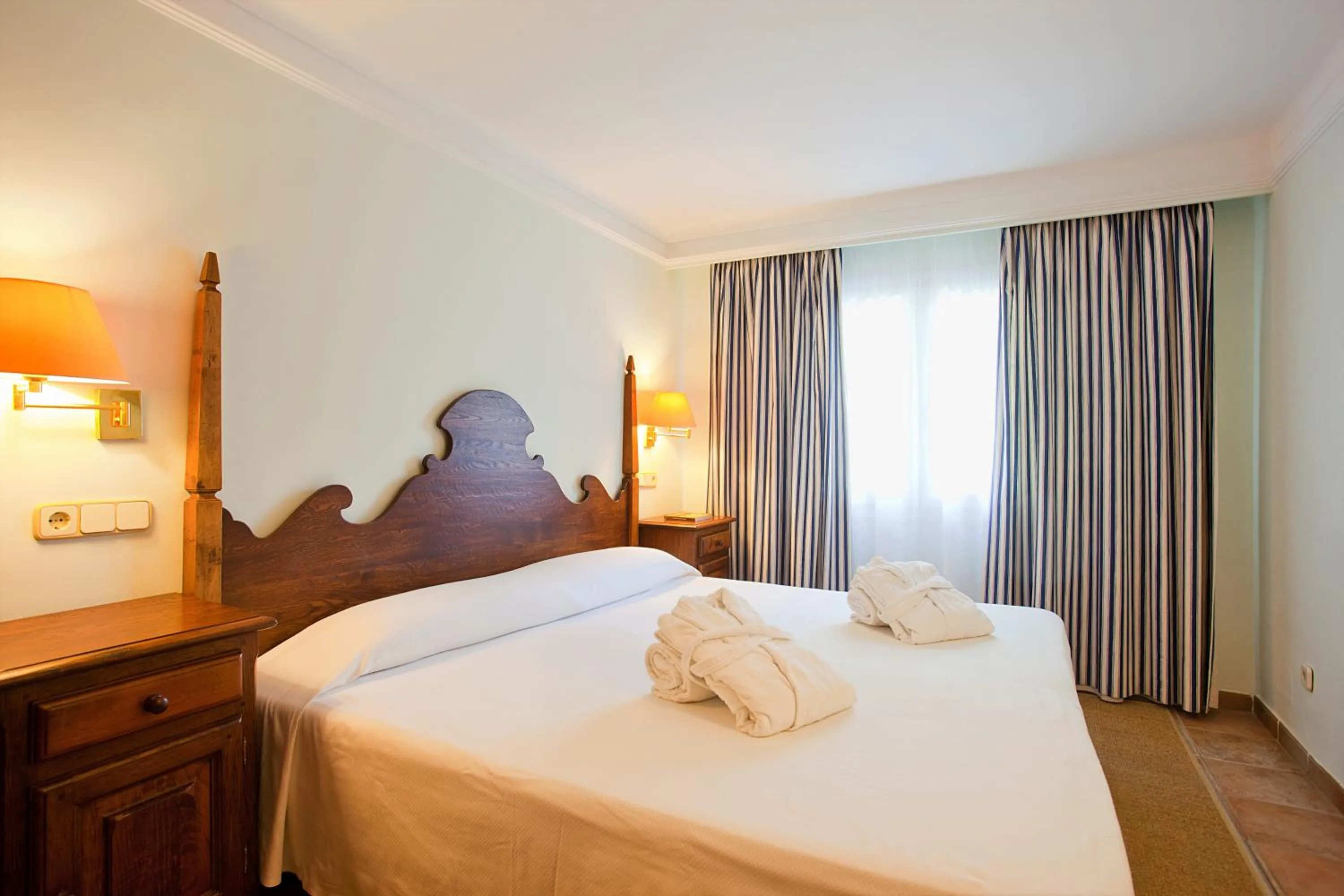Photo of the whole room, Bed in Hotel Cala Sant Vicenç - Adults Only