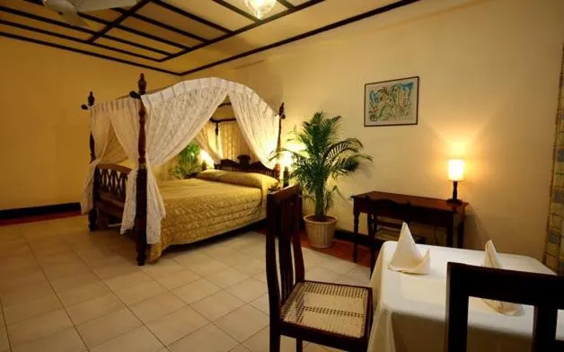 Bed in Grand Oriental Hotel