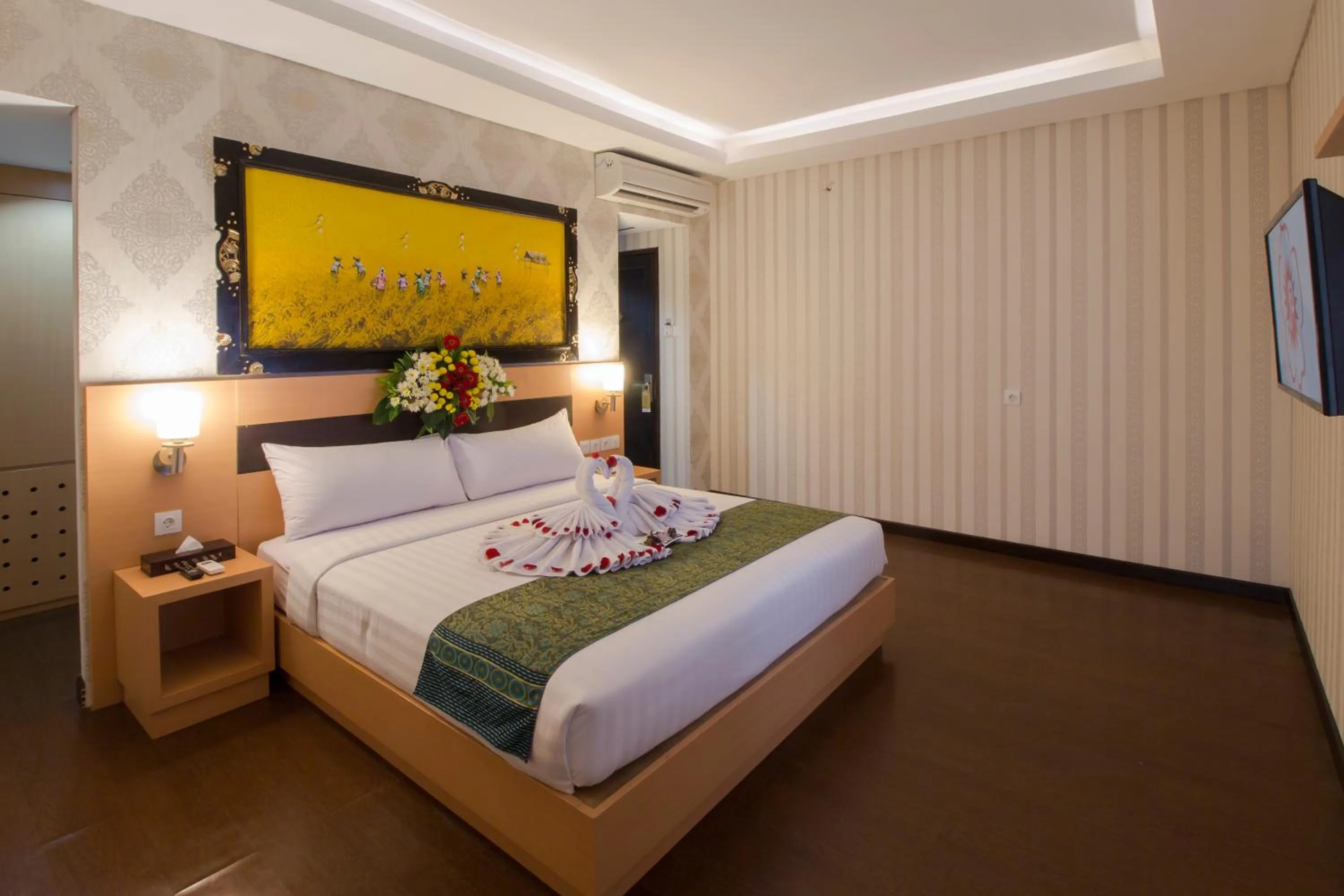 Bed in Grand Puri Saron Hotel Yogyakarta