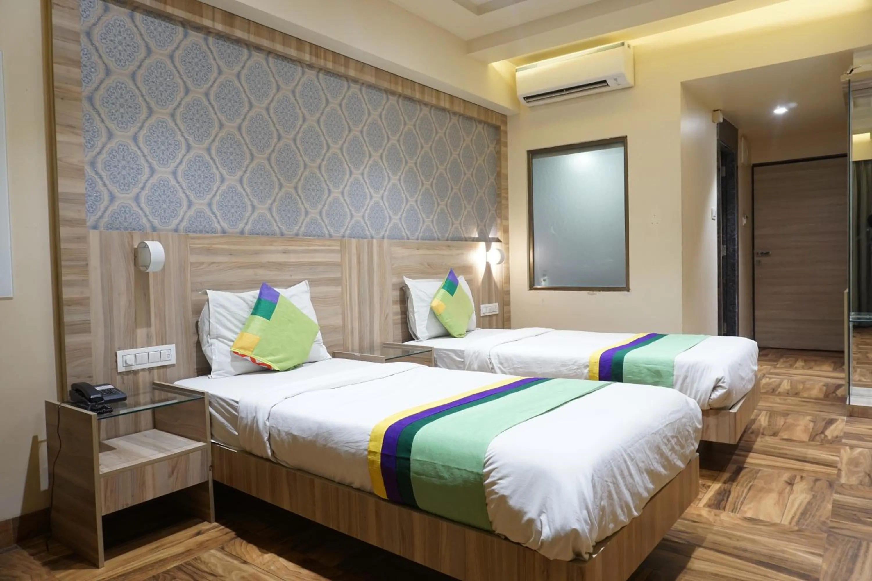 Bedroom, Bed in Treebo Classic Grande, Camp