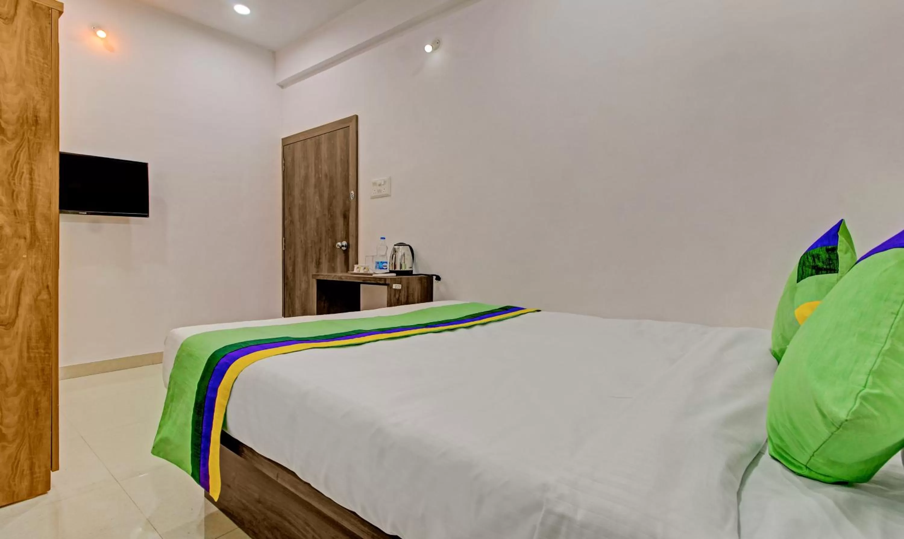 Bed in Treebo Trend White House