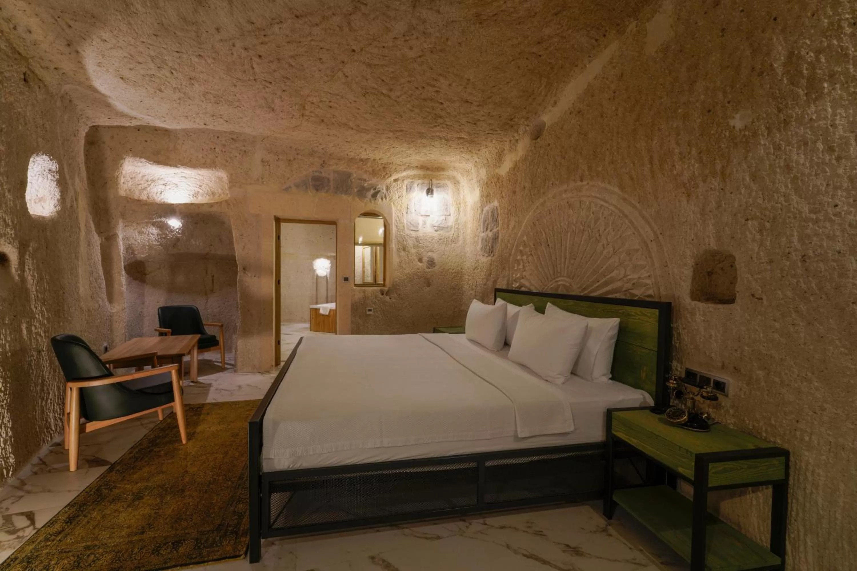 Bed in The Niche Cave Hotel