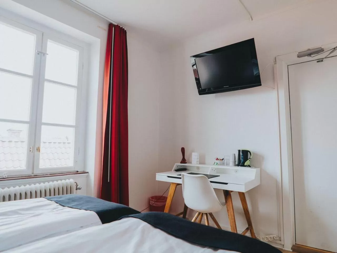 Photo of the whole room, Bed in Arboga Stadshotell