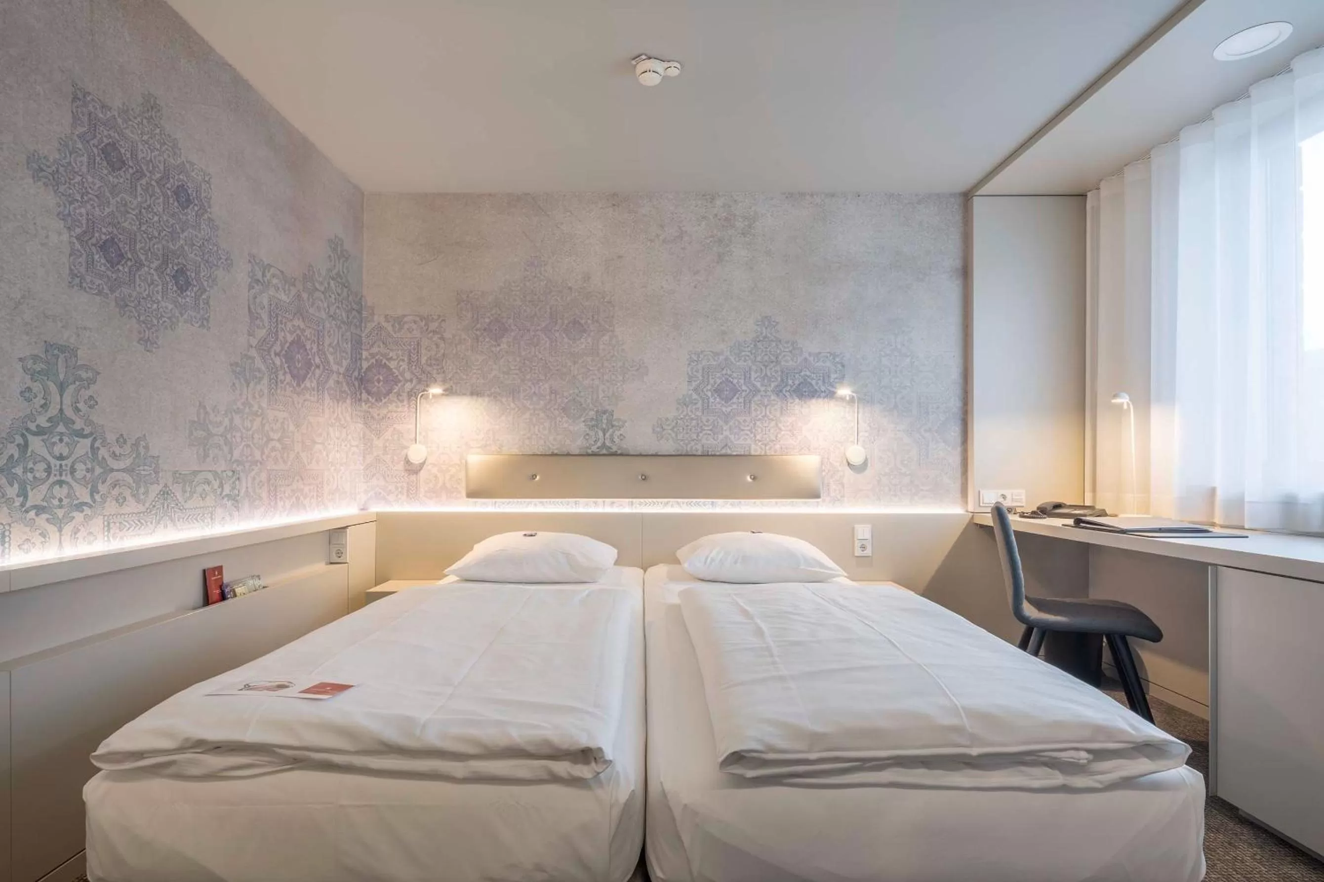 Photo of the whole room, Bed in Stadthotel Münster