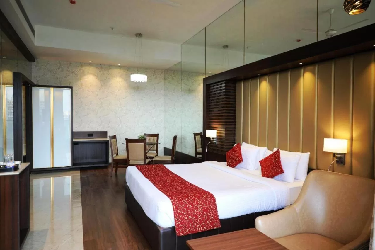 Bed in Hotel Gurudev Grand