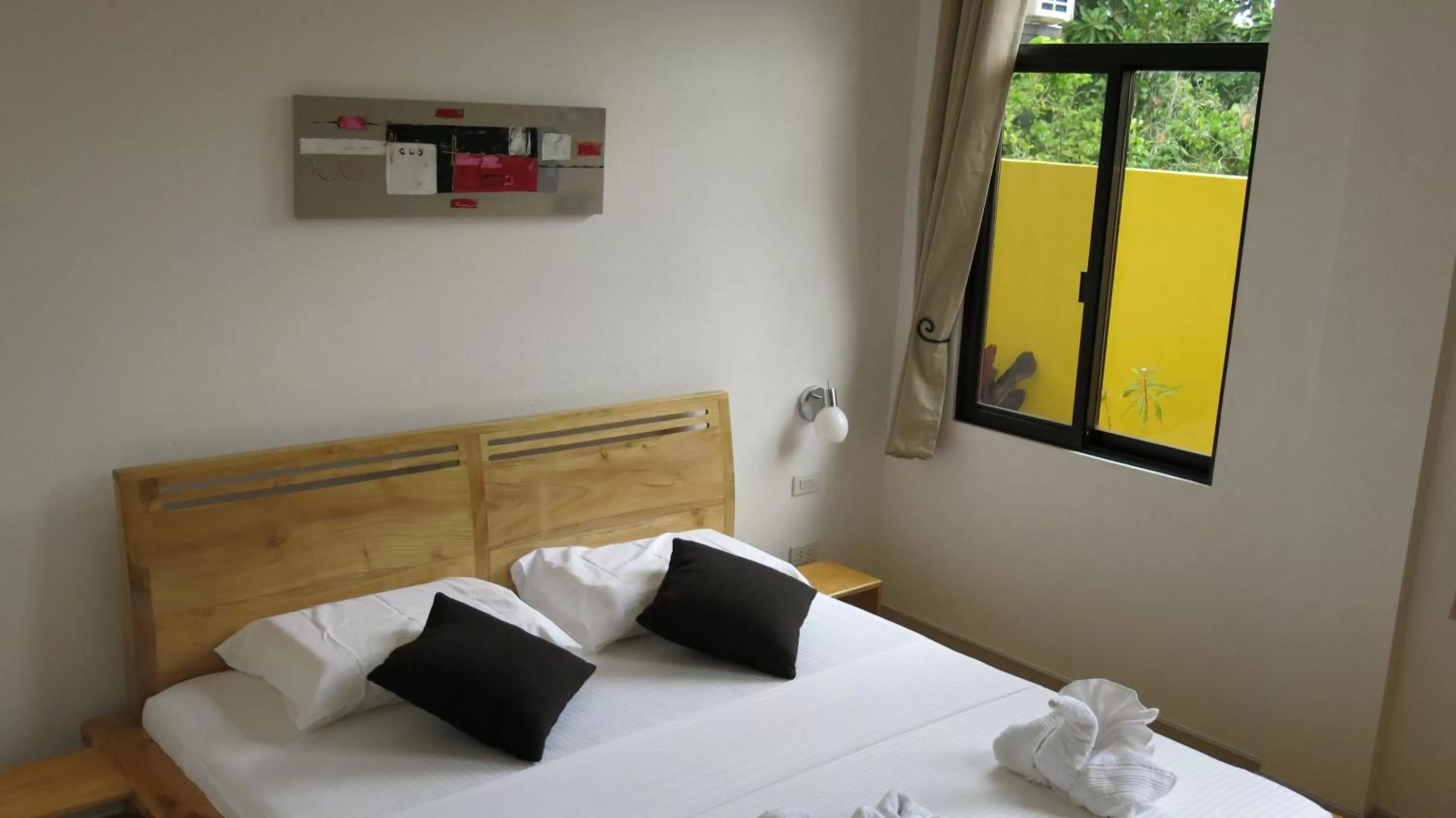 Bed in Alona's Coral Garden Resort (Adult-Only)