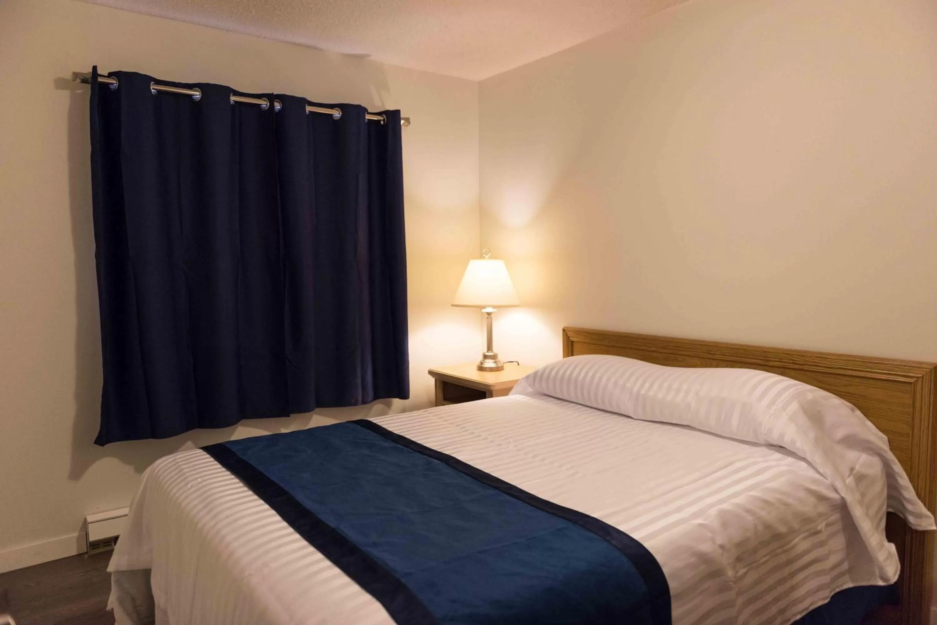 Bed in Radium Park Lodge