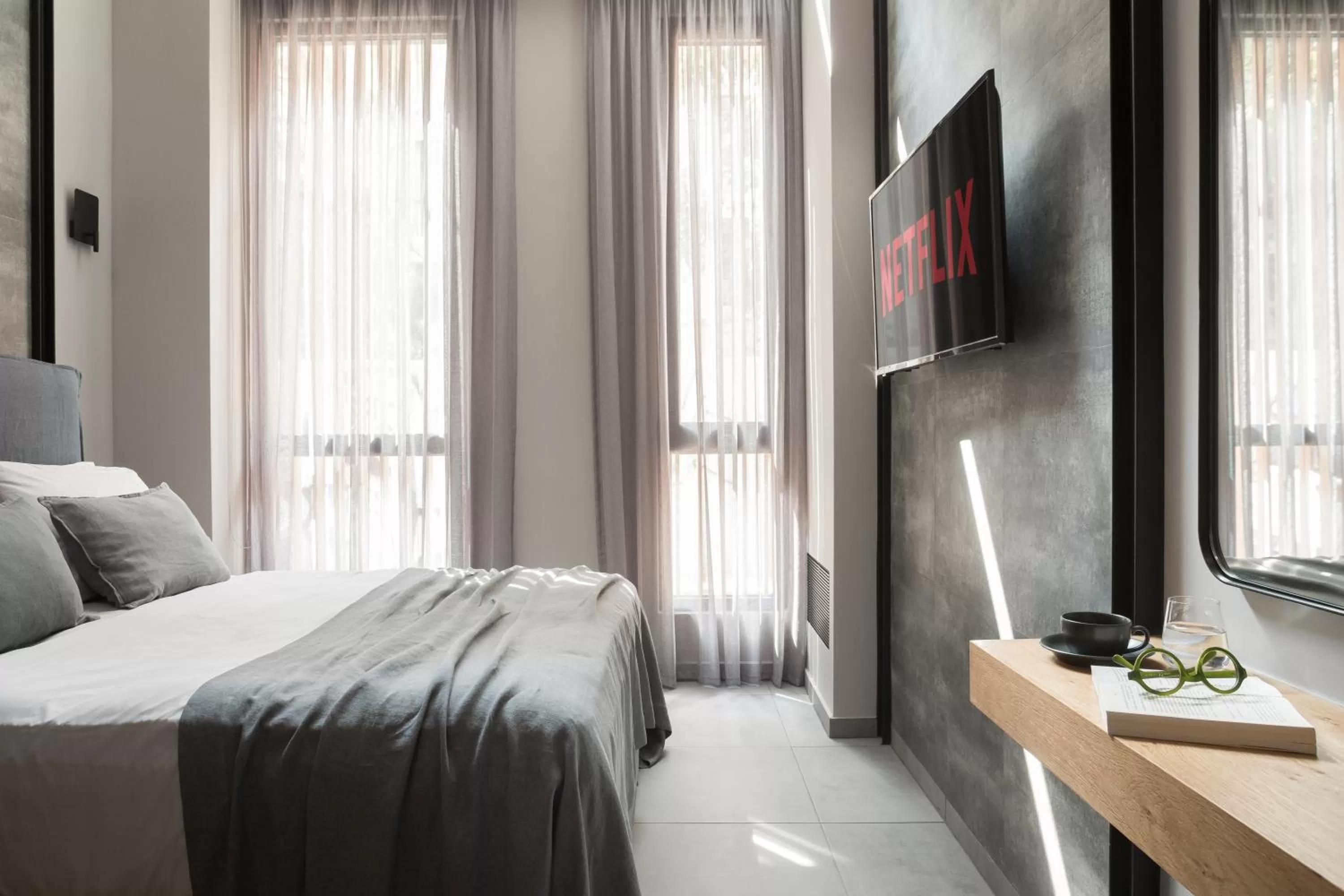 Bed in 11 Enteka Acropolis Suites