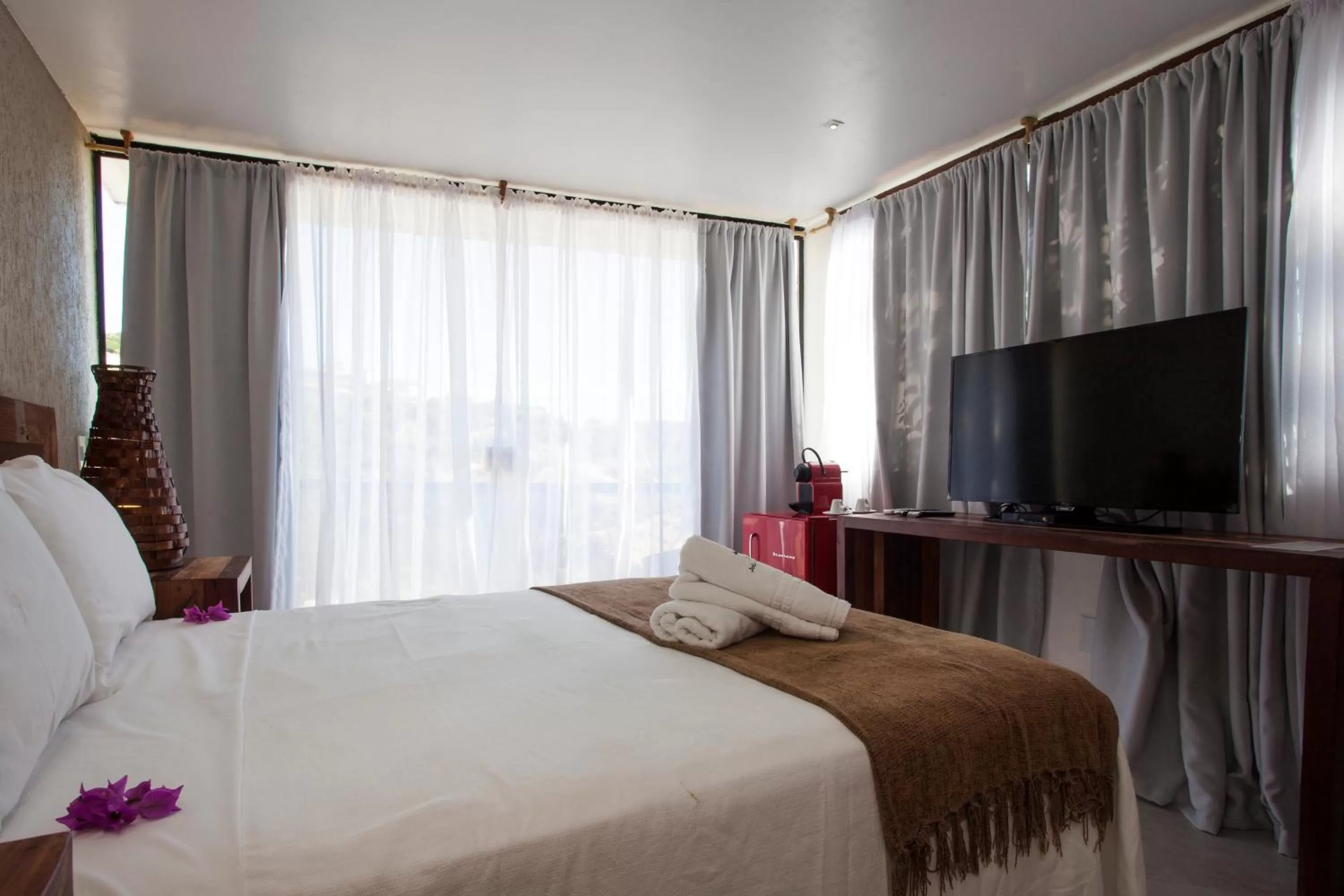 Bed in Pousada Praia João Fernandes