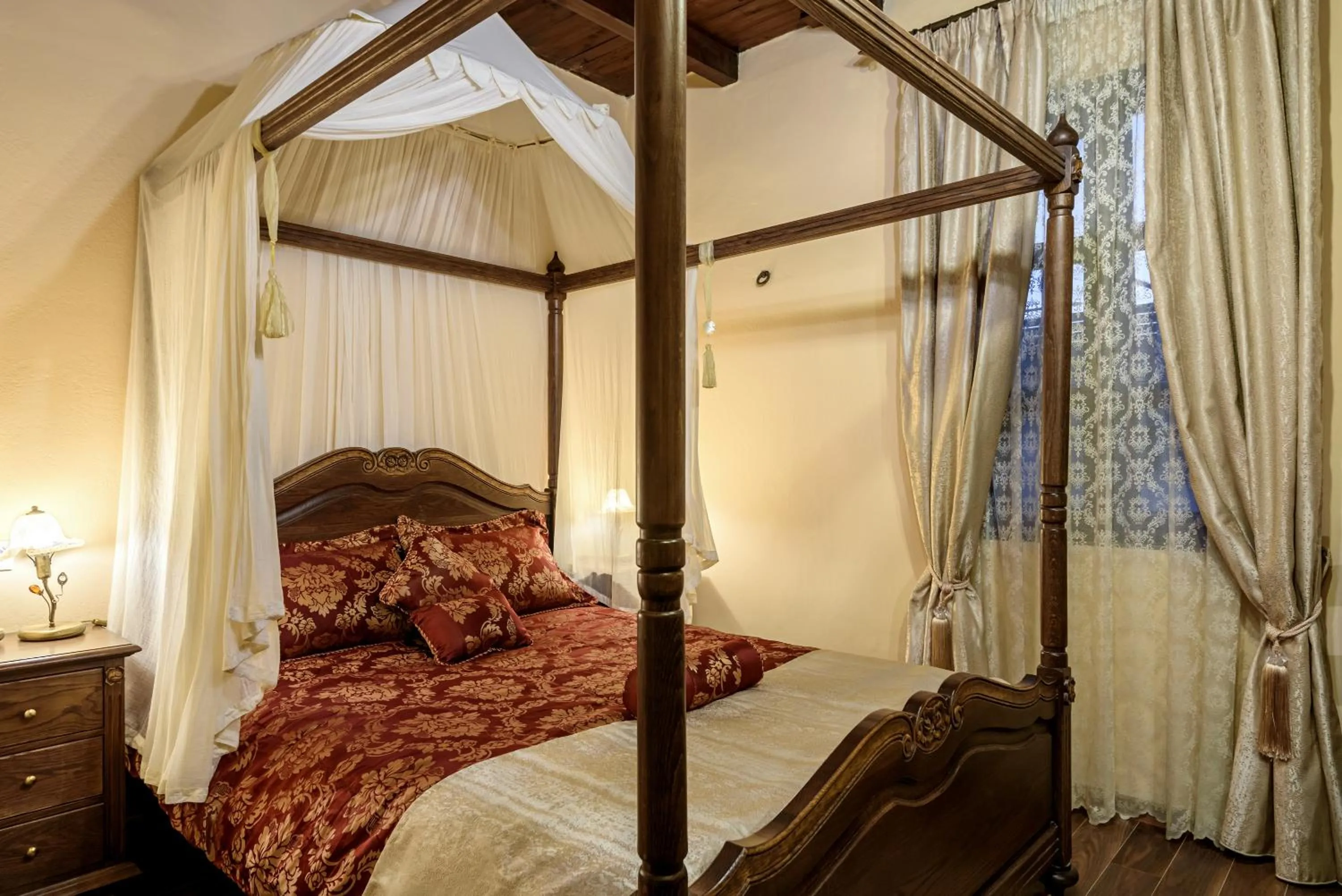 Bed in Porto Del Colombo Traditional Boutique Hotel