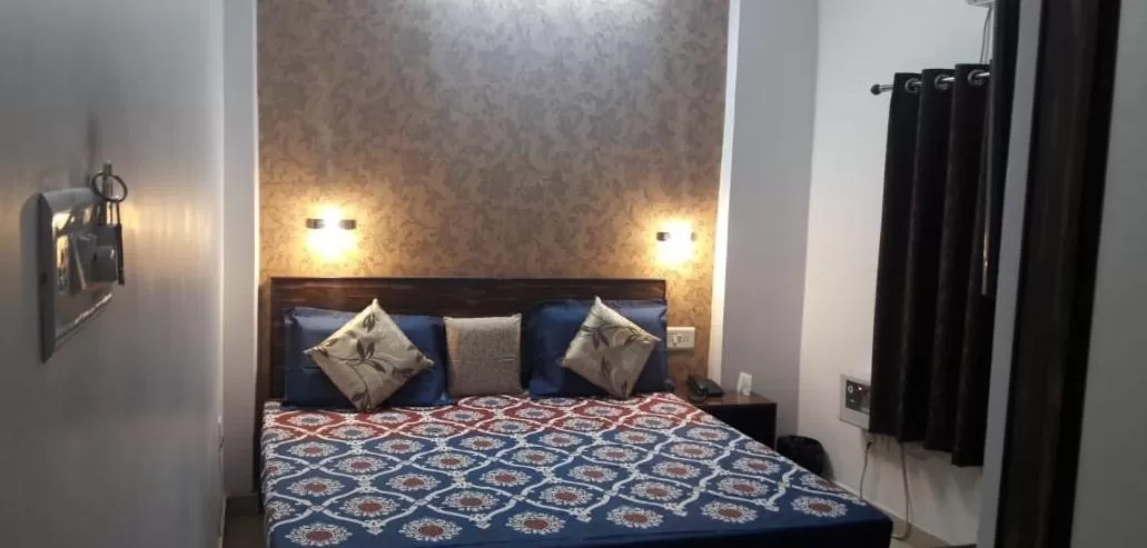 Bed in Hotel Kanha Inn Charbagh