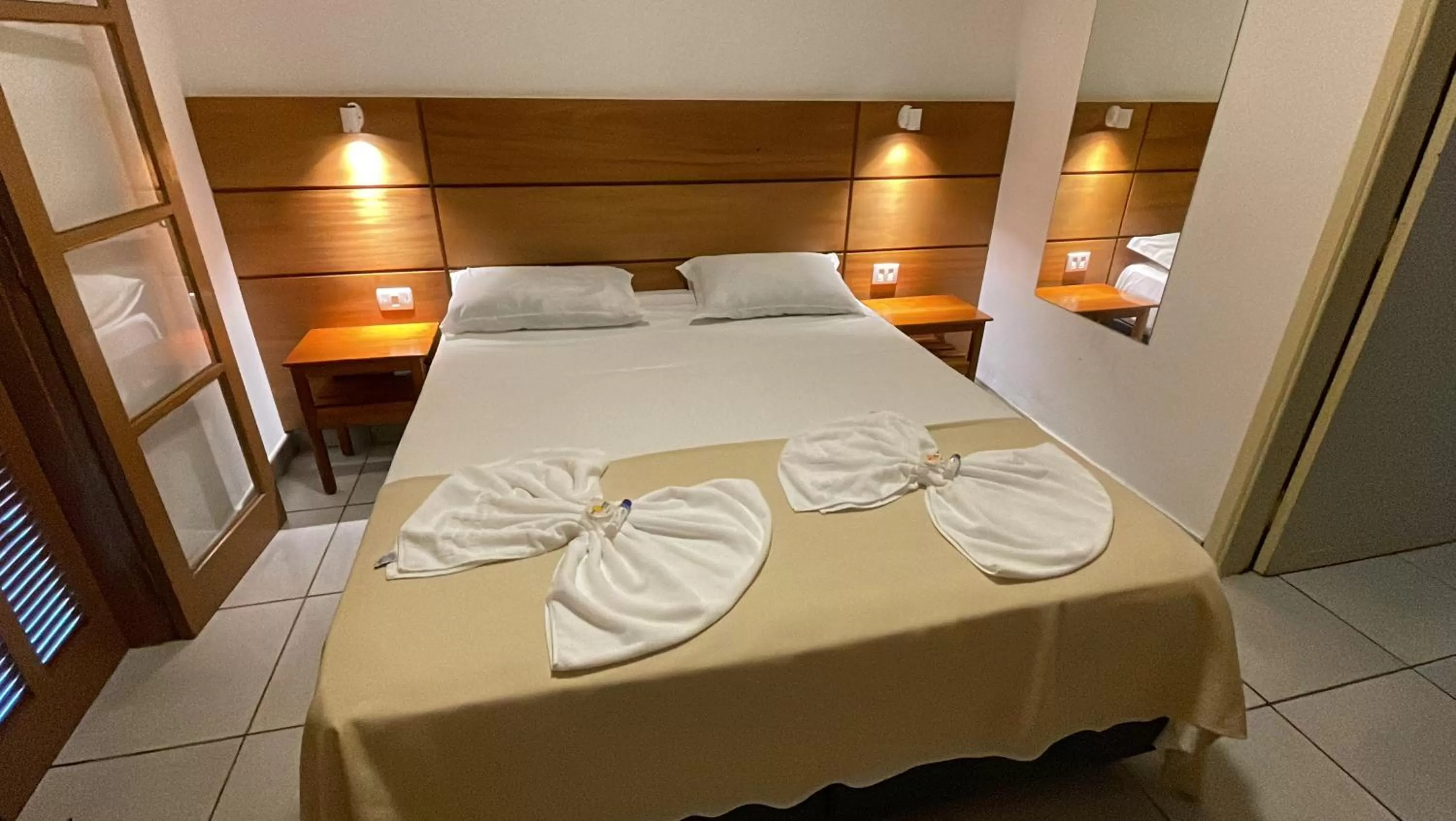 Bed in Pousada Ilha Vitoria