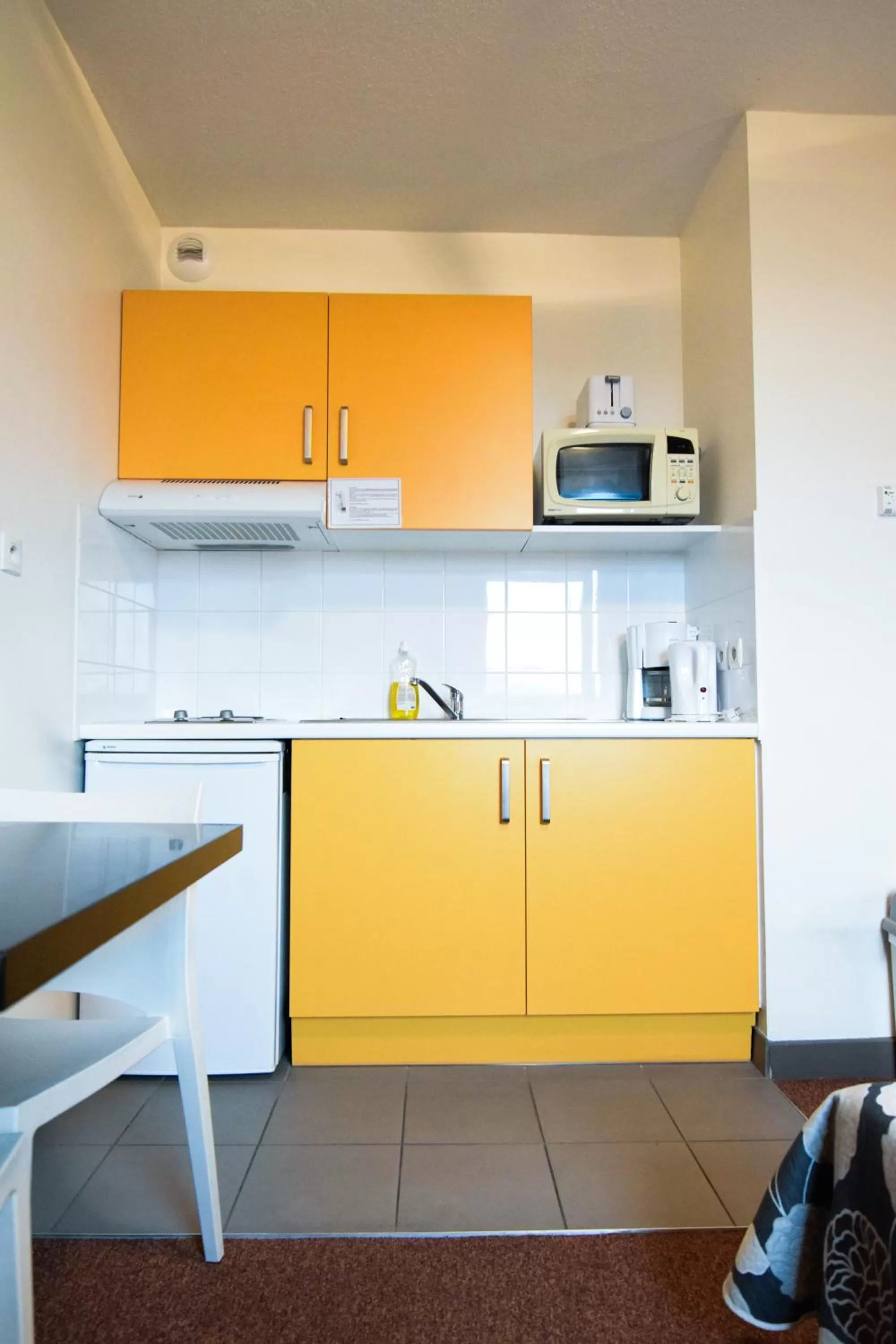 Kitchen or kitchenette in Residhotel Lyon Lamartine