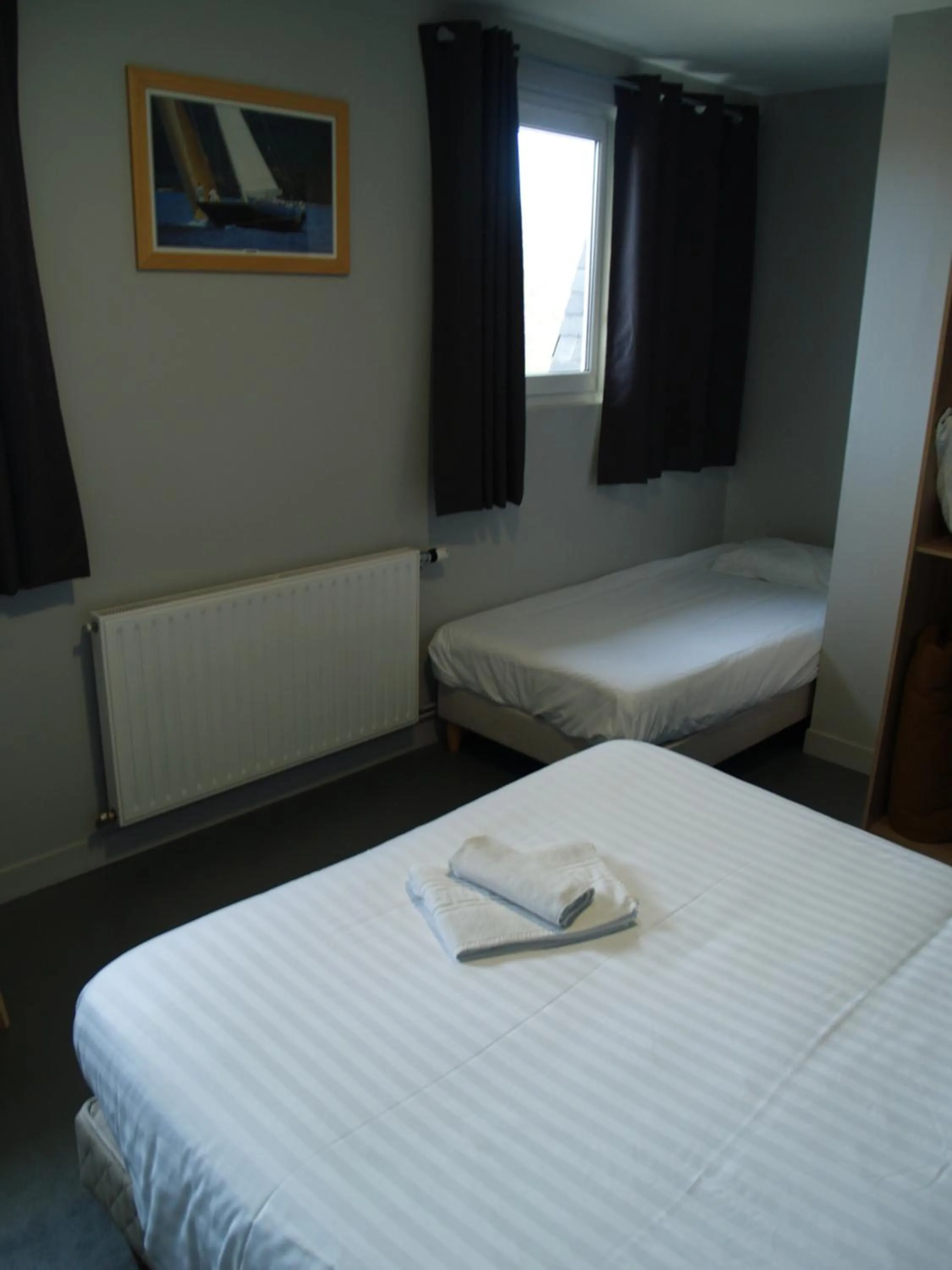 Bed in Le Relais Vauban