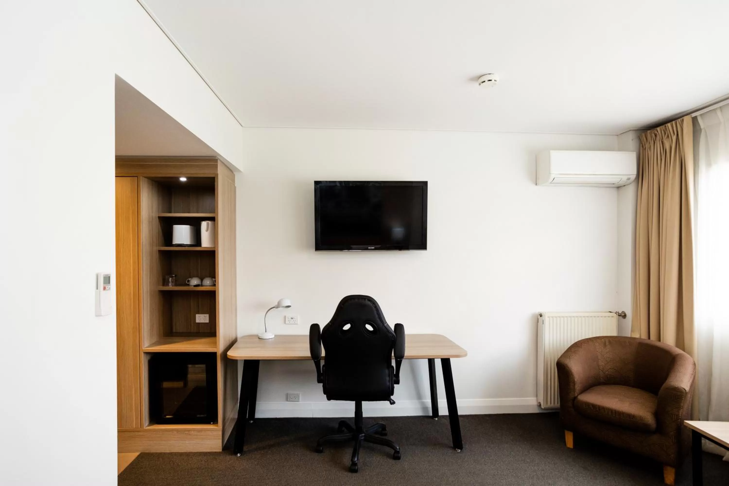 Seating area, TV/Entertainment Center in Mantra Bathurst