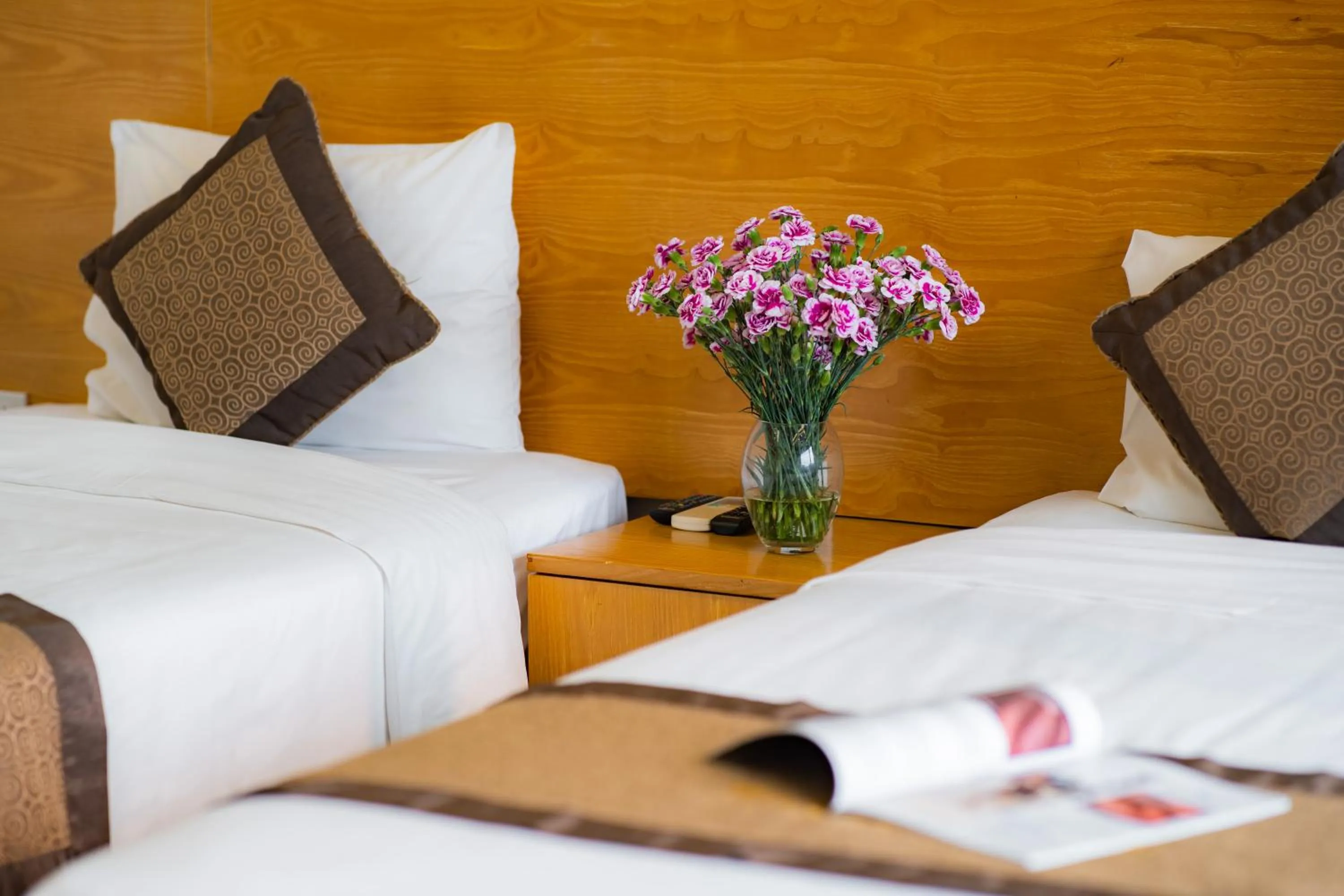 Bed in Riverside Hanoi Hotel