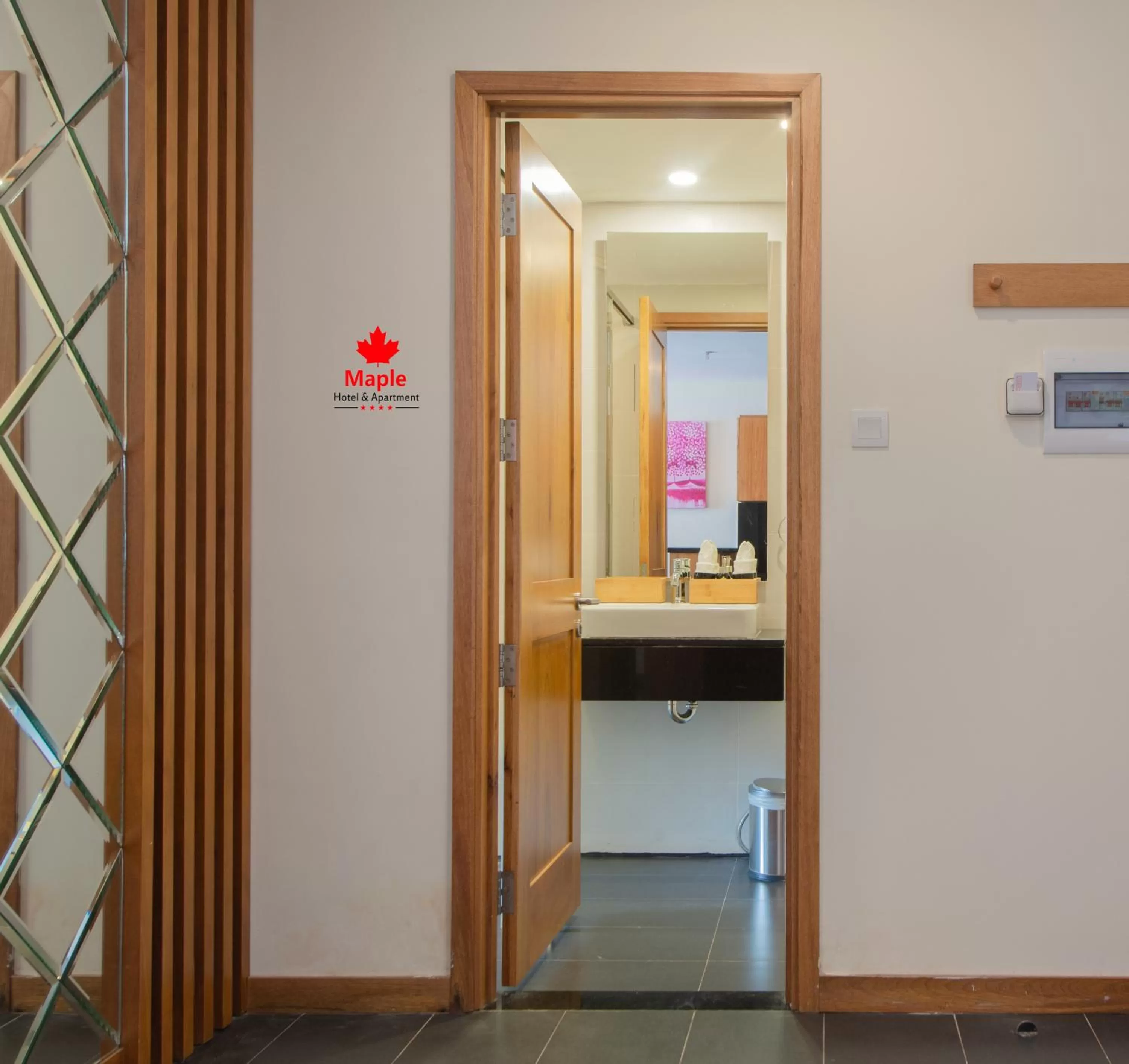 Toilet in Maple Hotel & Apartment