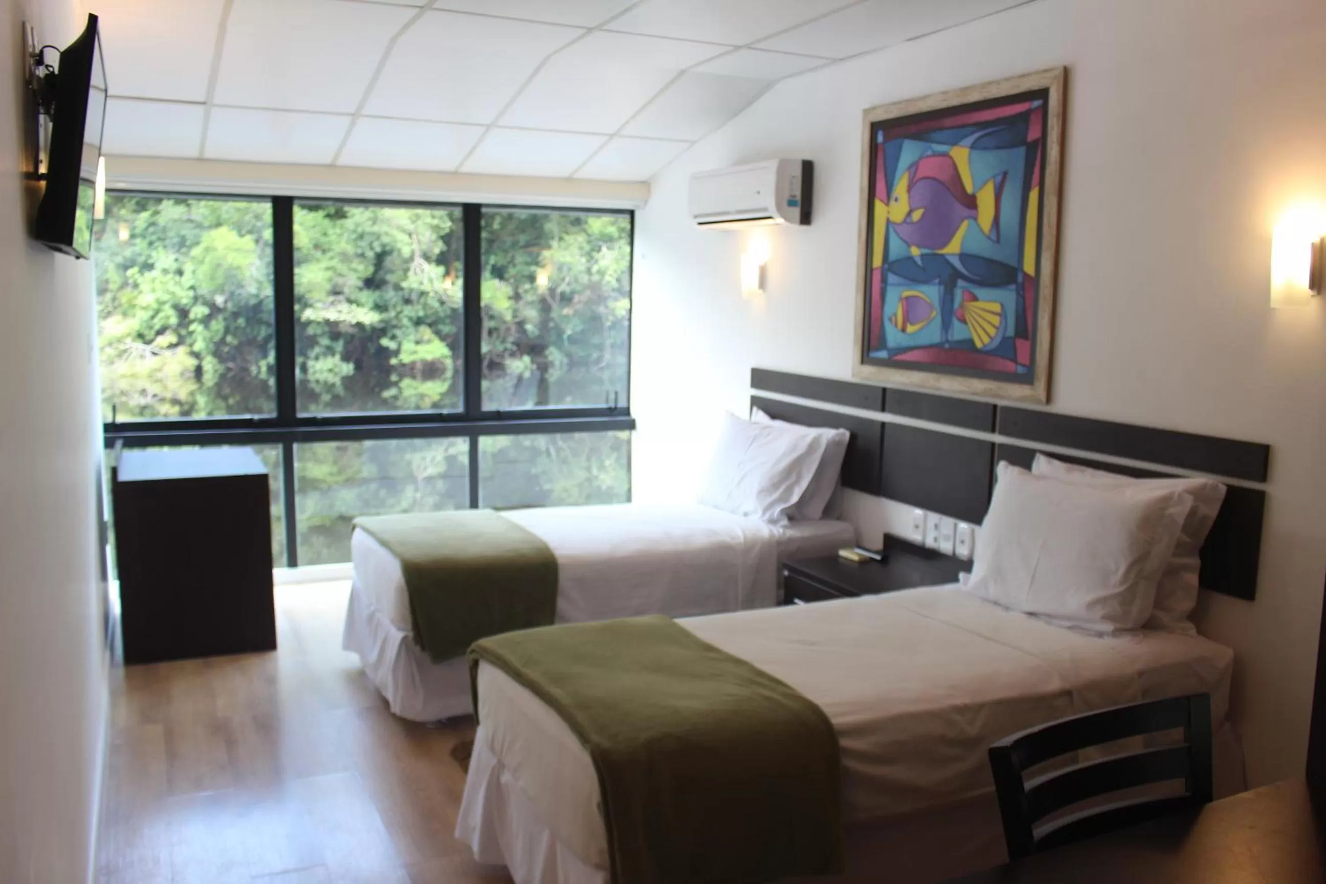 Bed in Uiara Amazon Resort