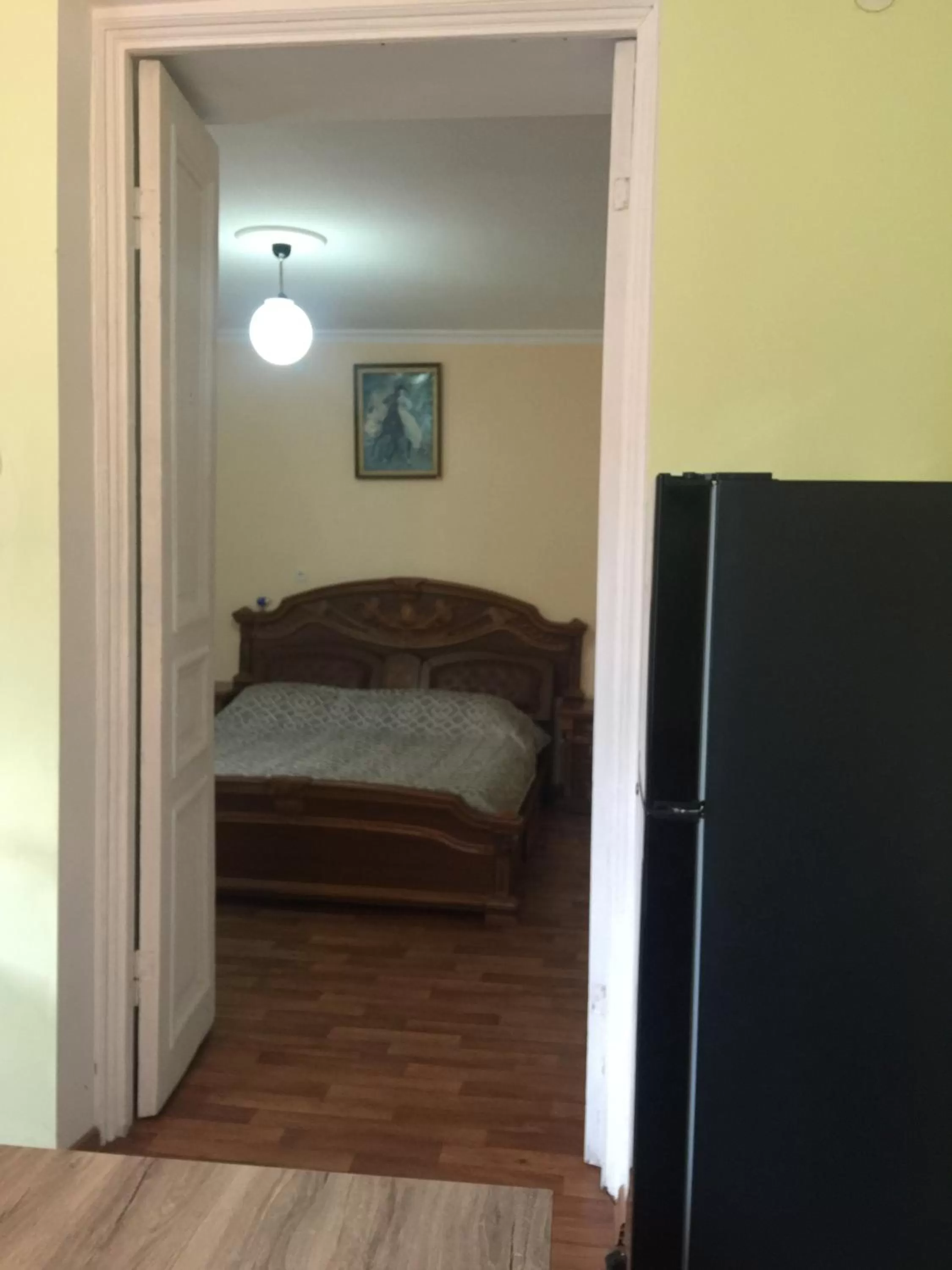 Bed in Nika's Guest House