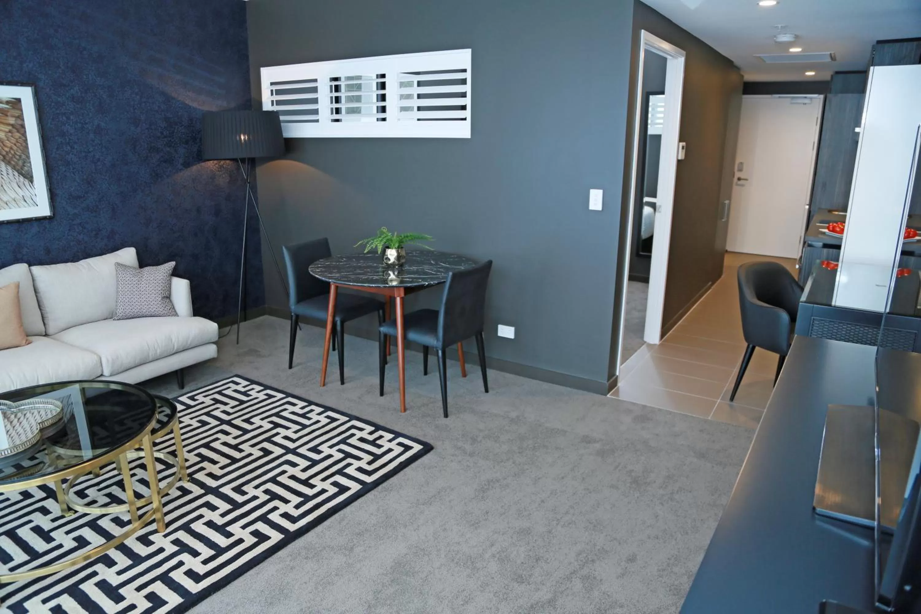 Living room in Alex Perry Hotel & Apartments