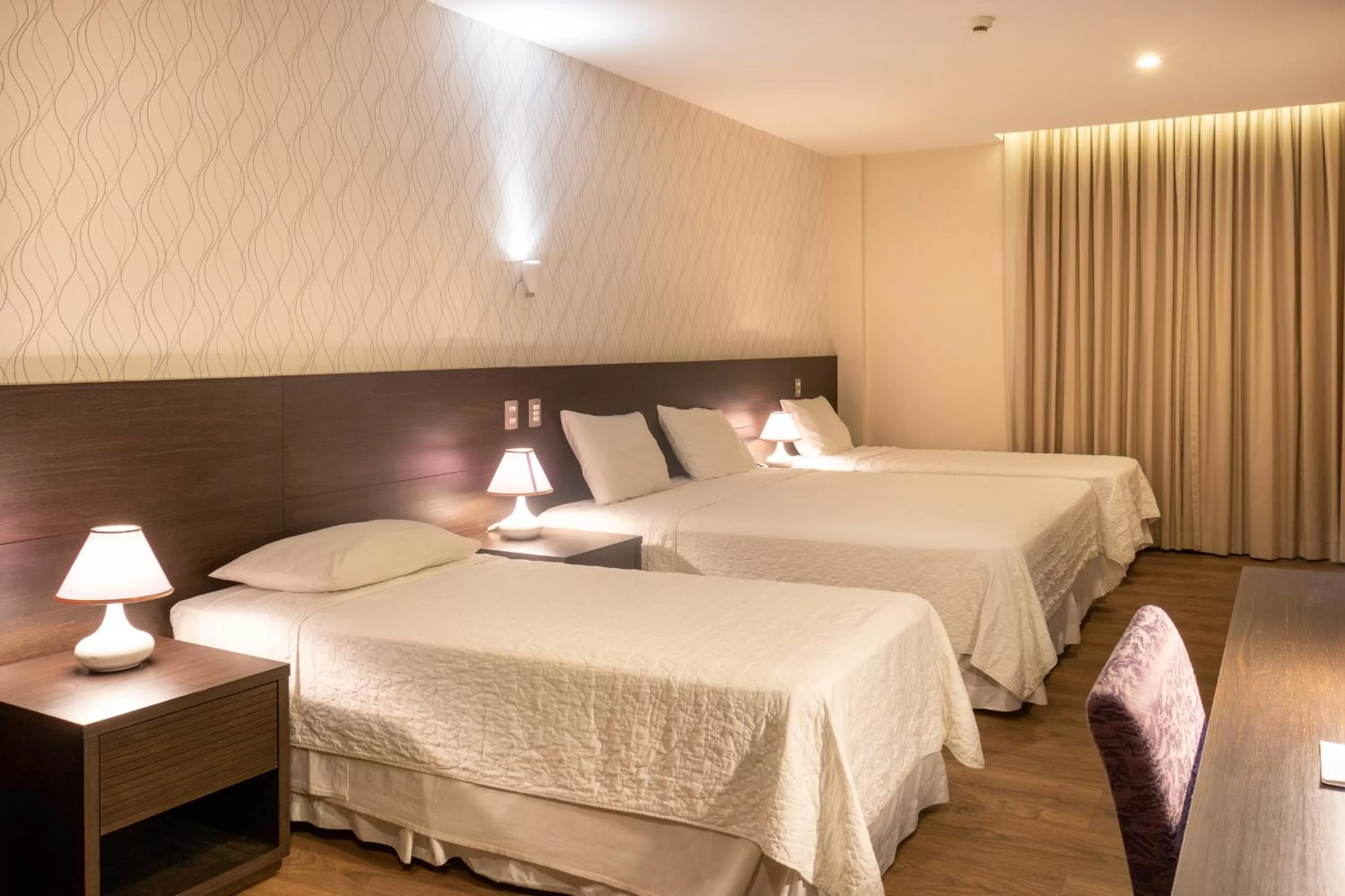 Bed in Arosa Rio Hotel