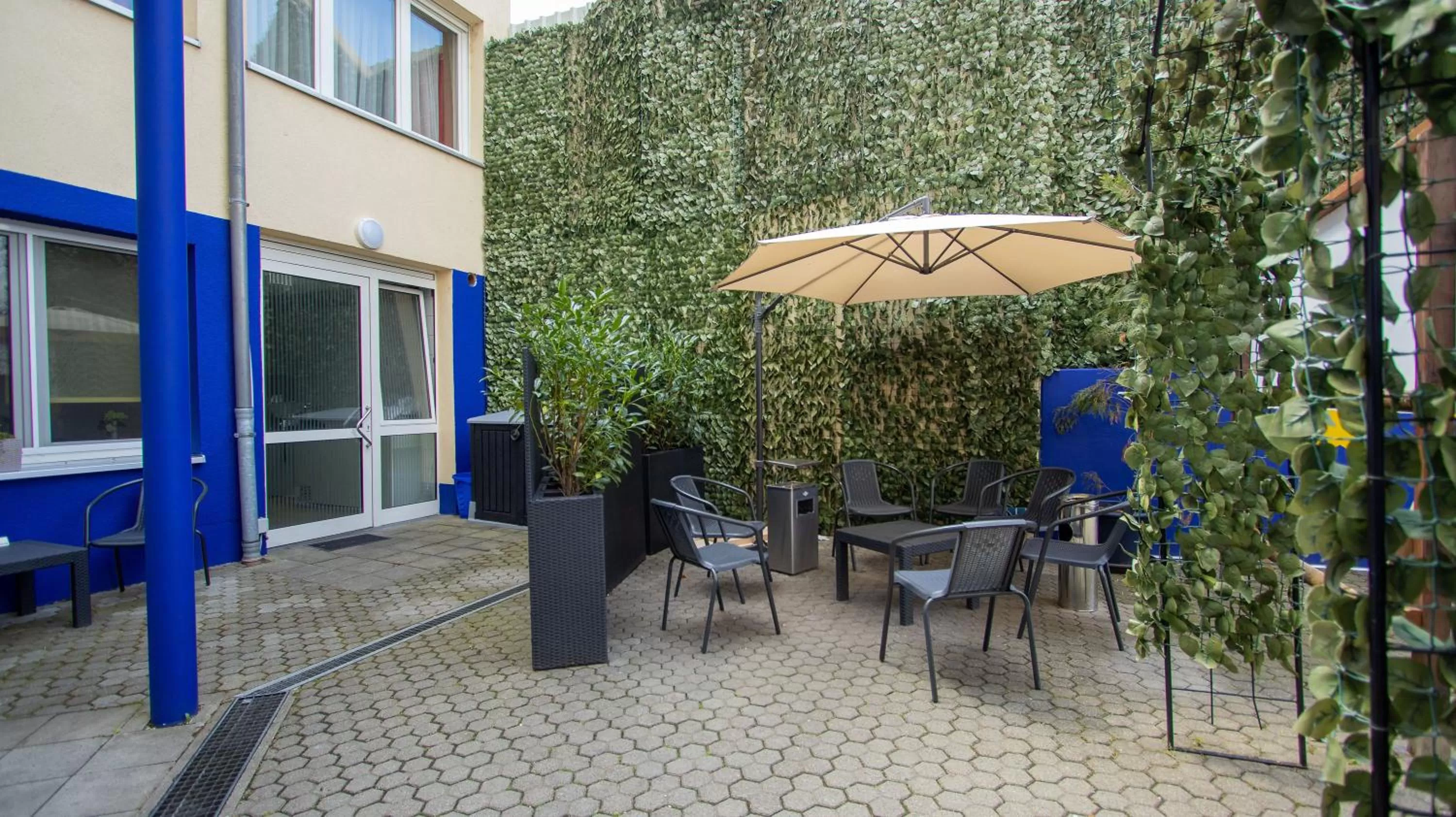 Seating area, Patio/Outdoor Area in LeoMar Hotel