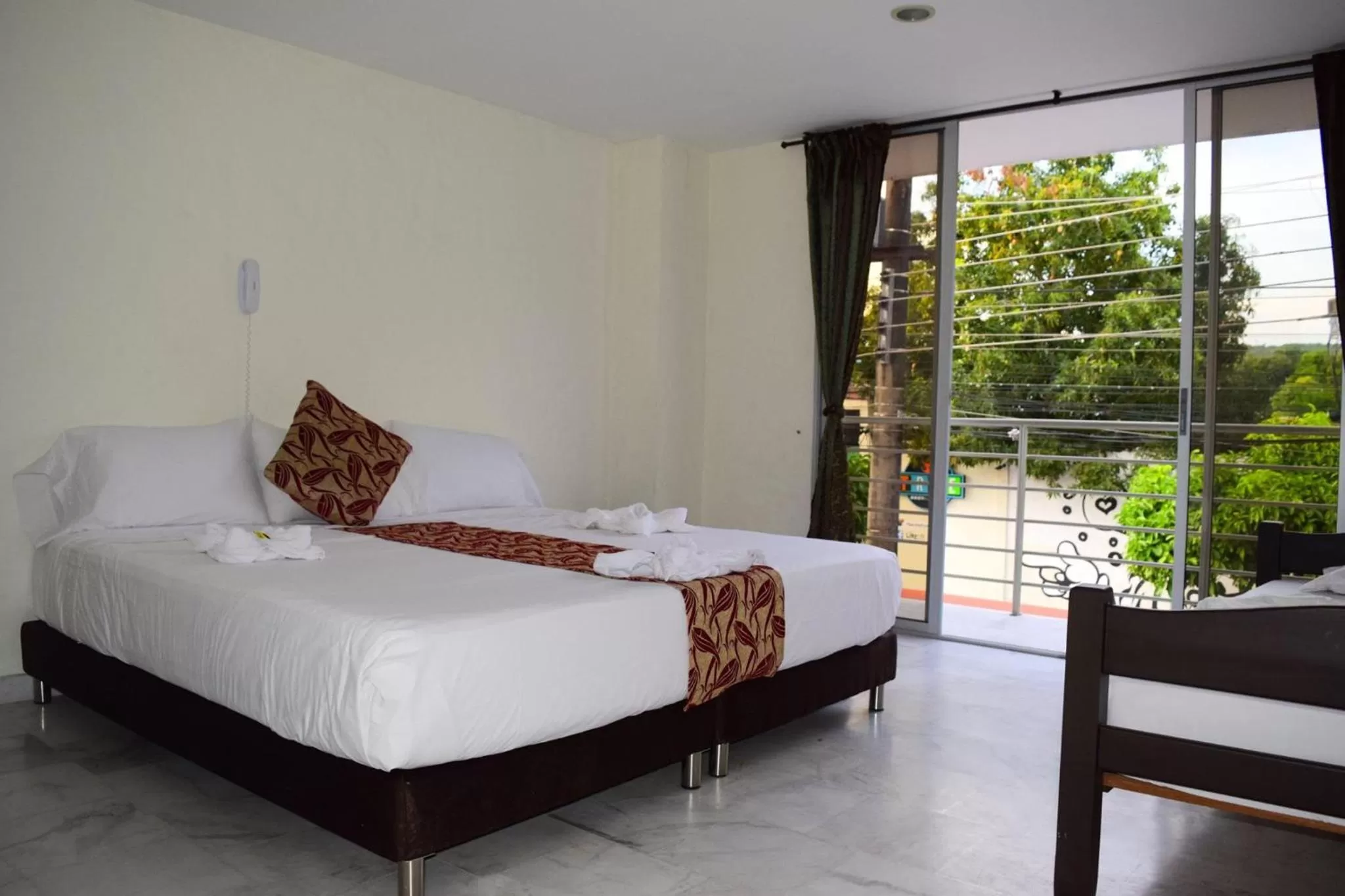 Bed in Blue Star Hotel